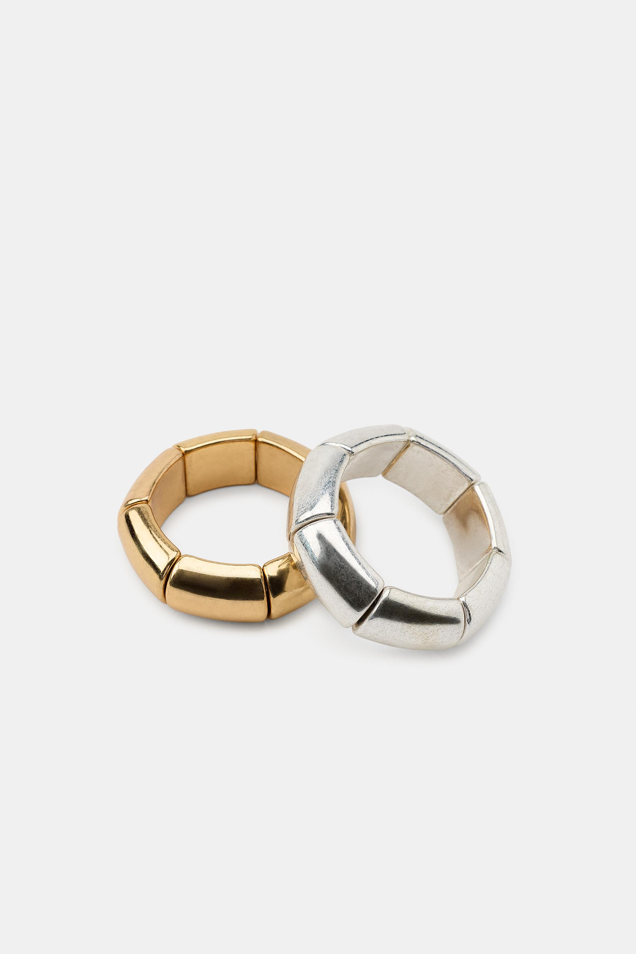 Pack of four elastic bracelets in assorted sizes with metallic piece appliqu\u00e9s. | Zara US