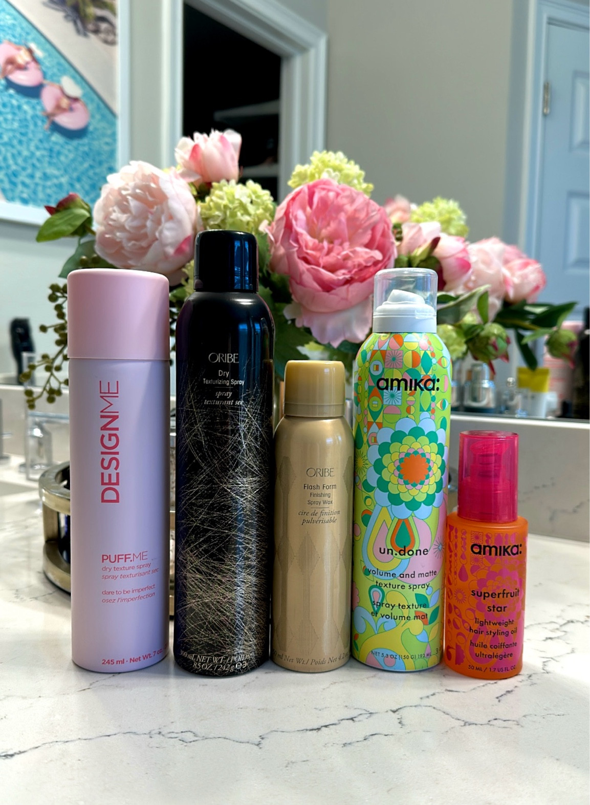 My favorite dry texture sprays. The strongest on the left and lightest to the right. The lightweight oil I apply first before the dry texture sprays. This gives a smooth, shiny look without weighing the hair down  

#LTKBeauty