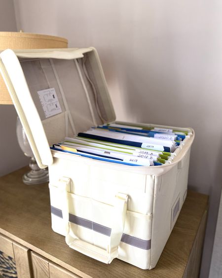 It’s time to organize the documents you used for your taxes away and this filing box is just perfect for it. 
Place your important documents, statements and everything you don’t need on a regular basis safely away in it and in a storage area  

#LTKbaby #LTKhome #LTKfamily