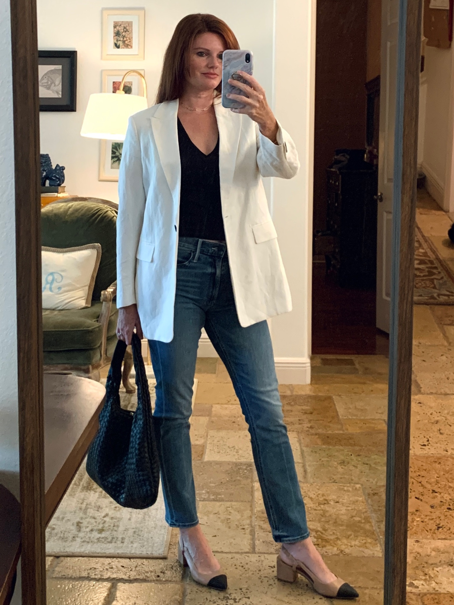 Teacher outfit look 2. I love this minimalist chic look for the classroom! Straight leg jeans, bottega veneta dupe bag, white blazer, v neck tee, black cap toe shoes

I love a pair of black cap toe shoes. They are incredibly versatile and classic!

#LTKworkwear #LTKstyletip #LTKBacktoSchool