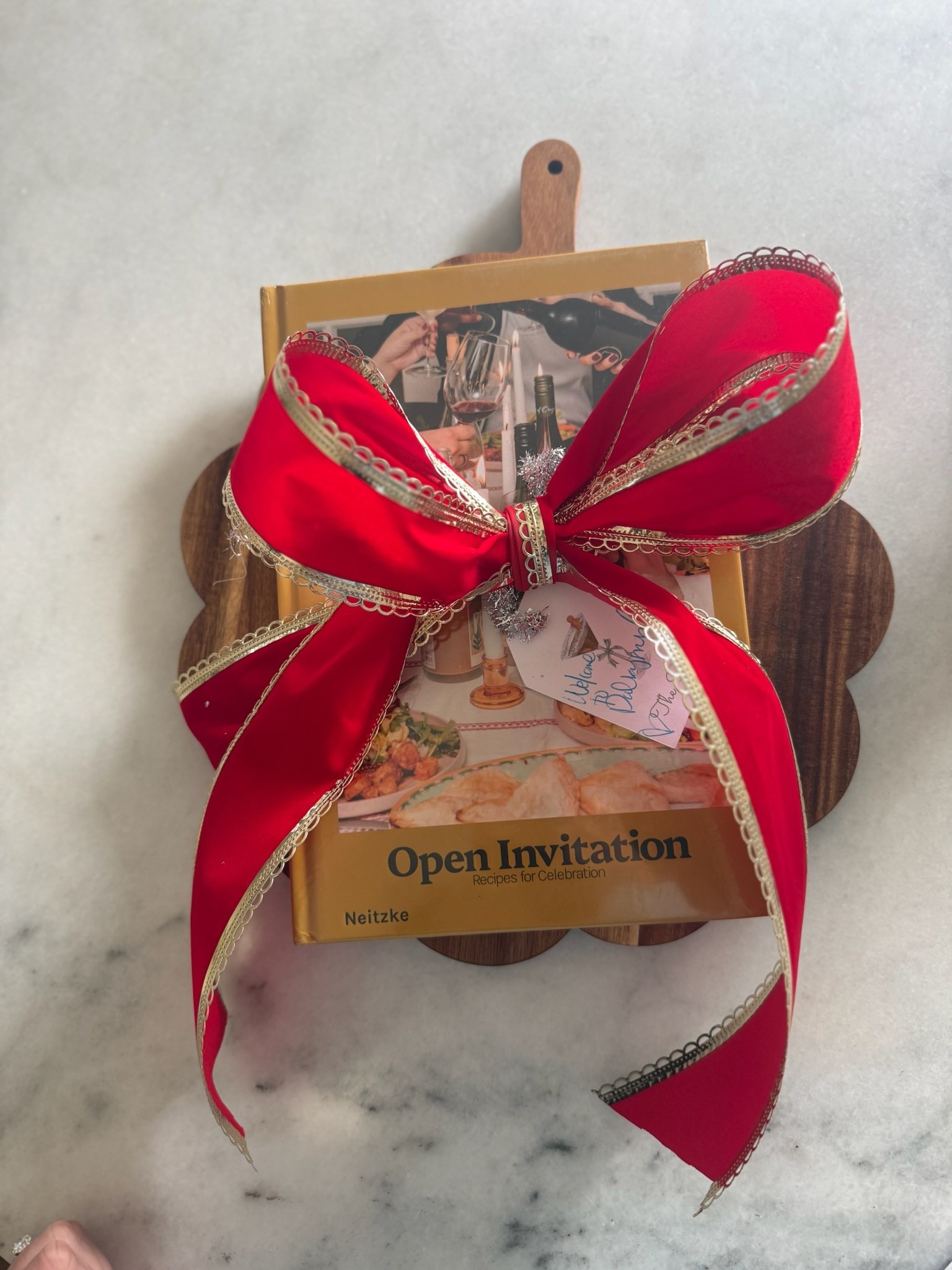 Such a fun gift to give!! Cheese board, cookbook, and fun ribbon!! 

#LTKHoliday #LTKFindsUnder100 #LTKGiftGuide