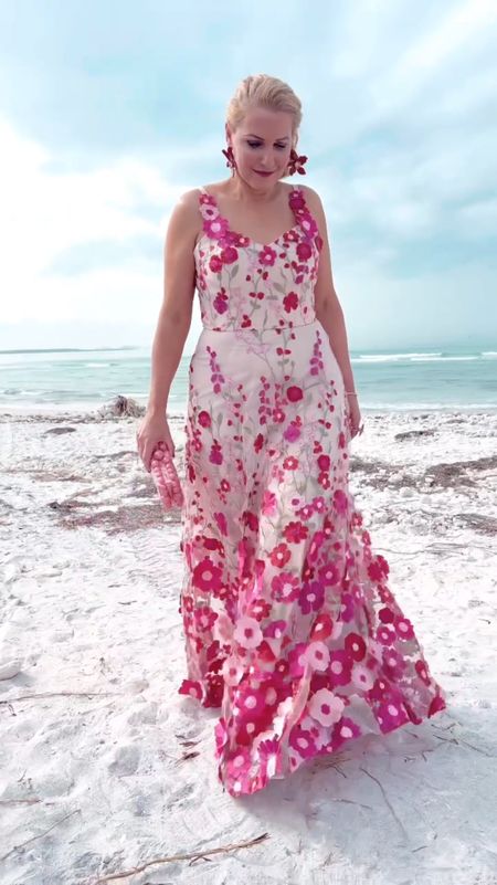 👰🏼‍♀️AW BRIDAL: #ad This fuchsia red floral dress from @aw.bridal is SPECTACULAR! #awbridal #floraldress #weddingguestdress #gardenpartydress

💯You can truly wear this as a bridesmaid dress, wedding guest dress, rehearsal dinner dress, prom dress, quinceanera dress, vow renewal dress or as a wedding dress. It’s under $150 too. 

❤️As I mentioned, it’s STUNNING!

🌸I’m wearing a size 10 and it fits PERFECT!

🫰🏻DISCOUNT CODE: Receive 10% off by using code: JTS10 at checkout.

👉🏼Follow my shop @jtstjtst11 on the @shop.LTK app to shop this post and get my exclusive app-only content!

#liketkit 
@shop.ltk

#weddingfashion #weddingdress #weddingguest #weddingguestoutfit #stylereels #reelsoutfits #styleinfluencer #styleinspo #weddingguestdresses #beachwedding #beachweddings #beachweddingdress #beachweddingideas #street2beachstyle #dunedin #dunedinflorida #lovefl #tampabloggers #stpeteblogger


#LTKSeasonal #LTKshoecrush #LTKstyletip #LTKitbag #LTKfindsunder50 #LTKfindsunder100 #LTKover40 #LTKmidsize #LTKtravel #LTKparties #LTKU #LTKwedding #LTKGiftGuide #LTKVideo