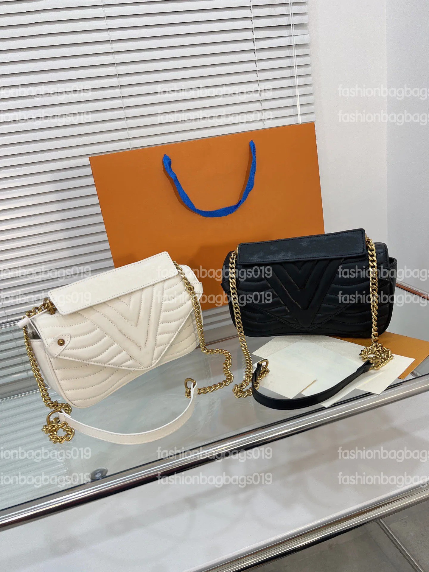 New Wave Chain Pochette Designer Bag Smooth Cowhide Leather Wave Pattern Quilting And A Rainbow C... | DHGate