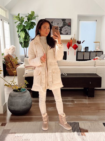 Winter outfit with cream pants in size XS and cream turtleneck sweater in size 00 paired with a down puffer coat for warmth and winter boots! Perfect for winter days, running errands and more 

#LTKstyletip #LTKSeasonal
