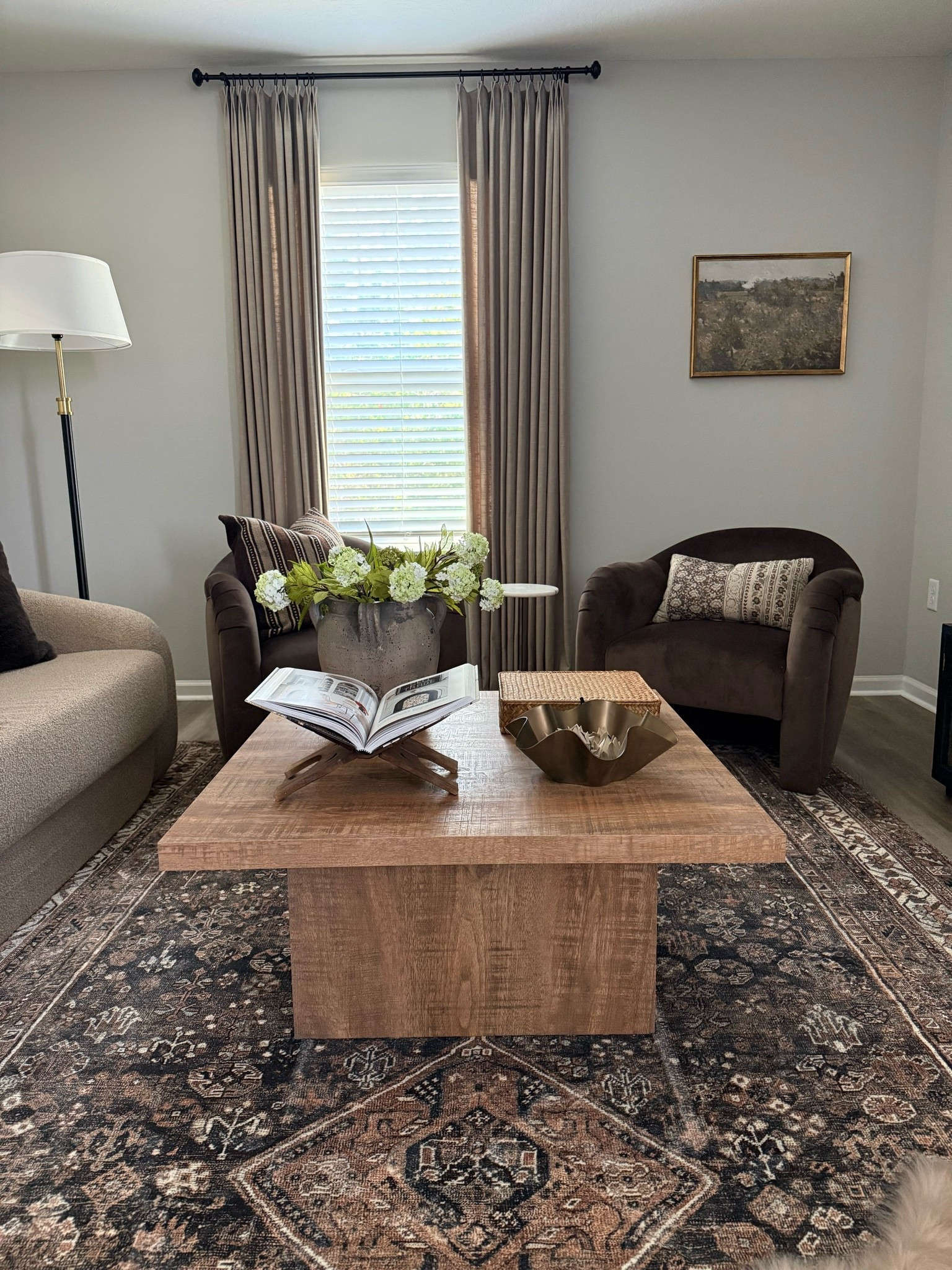 The viral coffee table is on sale! I love the beautiful wood color & it’s the perfect size for a smaller space! 😍👌🏽 

Wood coffee table, loft inspo, Amazon curtains, vintage inspired rug, living room inspo

#LTKHome #LTKSaleAlert