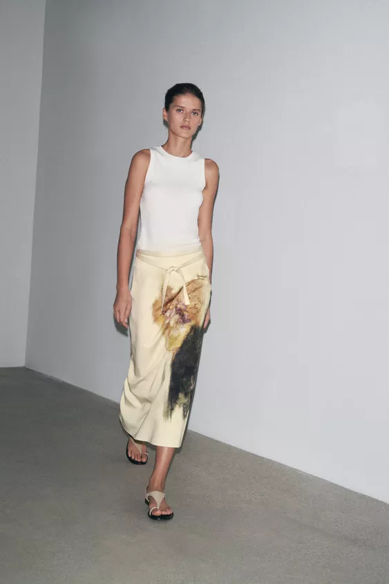 ZARA WOMAN COLLECTIONMid-waist midi skirt made of a 21% linen blend. Adjustable waist with tie fa... | Zara UK