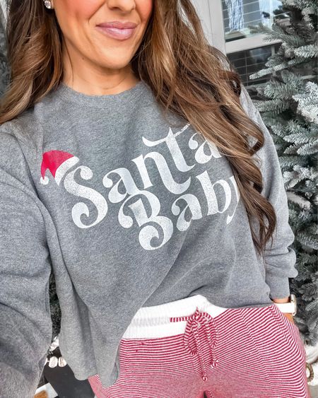 Target sweatshirt Santa 
Target pajama pants 
Runs TTS 

#LTKGiftGuide #LTKHoliday #LTKunder50