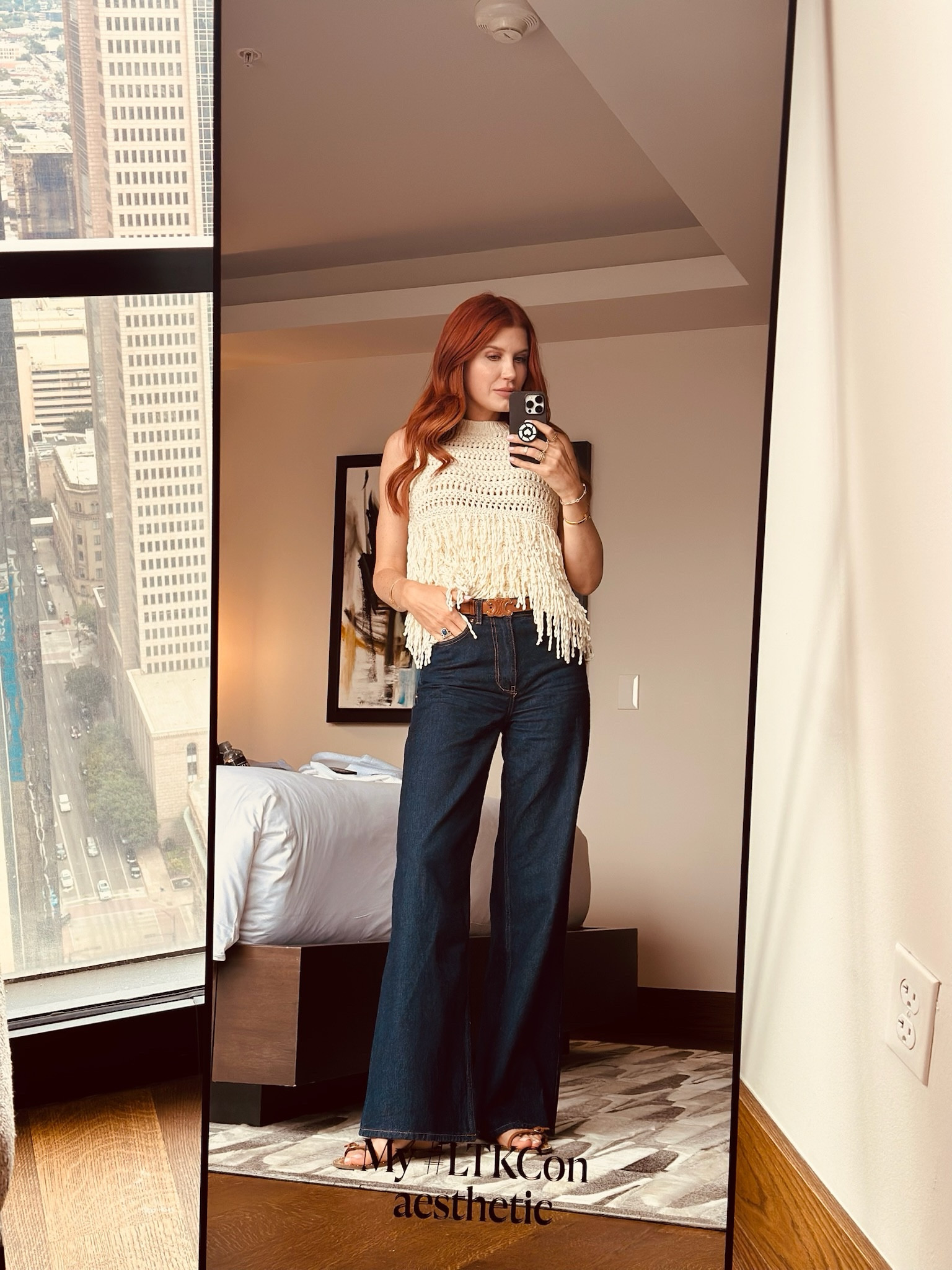 Landed in Dallas for #LTKcon💪🏻 
It’s still hot here so this is a great transition top for fall. The fringe is so fun and I tucked it in the front to show off my belt and add some shape. 

#LTKTravel #LTKWorkwear #LTKCon