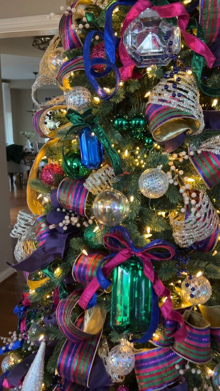 Bejeweled Christmas tree with colorful gem ornaments and lots of luxury ribbon 

#LTKhome #LTKHoliday #LTKSeasonal