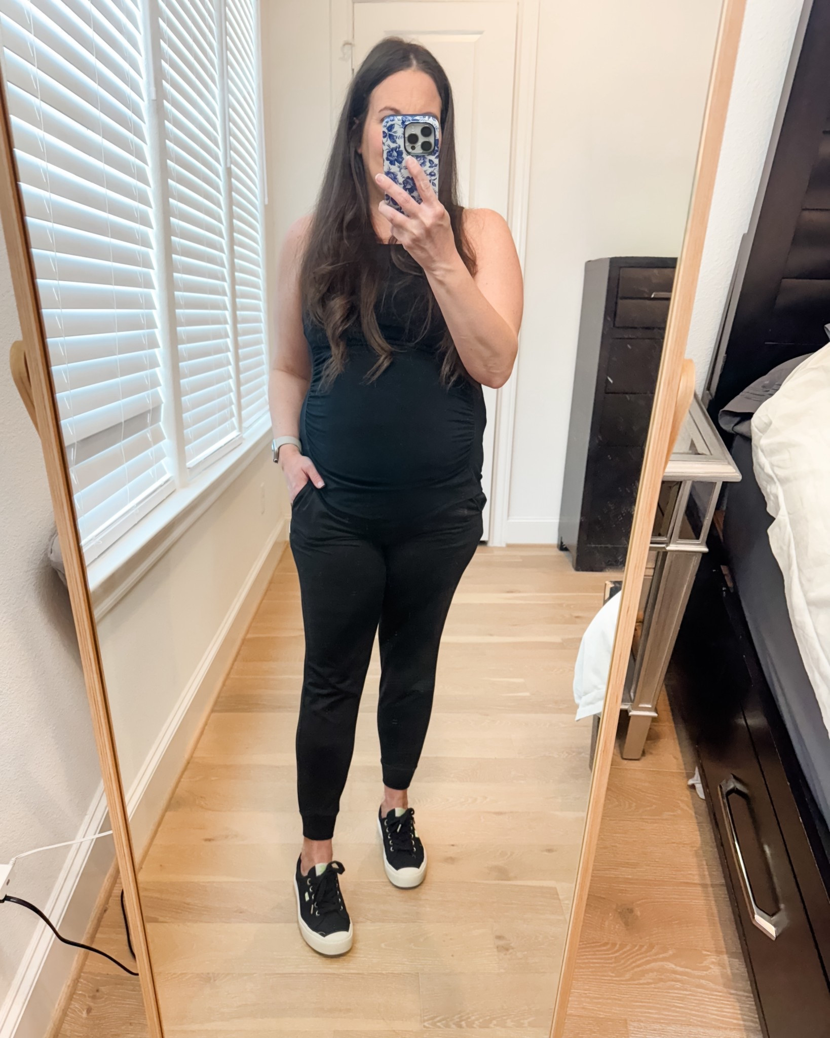 This comfy maternity outfit will be on repeat and checks all the boxes for everyday wear. If you’re looking for versatile loungewear that doubles as workout clothes, this all-black look is such a win. I’m wearing soft black jogger pants with a supportive black maternity tank top, finished with comfortable black sneakers for an easy, on-the-go vibe.

It’s the perfect blend of athleisure and casual style, making it one of my favorite pregnancy must haves. Whether you’re heading to a workout, running errands, or just relaxing at home, this is an outfit for women that stays comfortable and flattering through every stage of pregnancy.

Everything is linked below so you can recreate this bump-friendly athleisure look. The jogger panrs are not maternity. I’m wearing a small. 

#LTKBump #LTKActive #LTKSeasonal

#LTKBump #LTKSeasonal #LTKActive