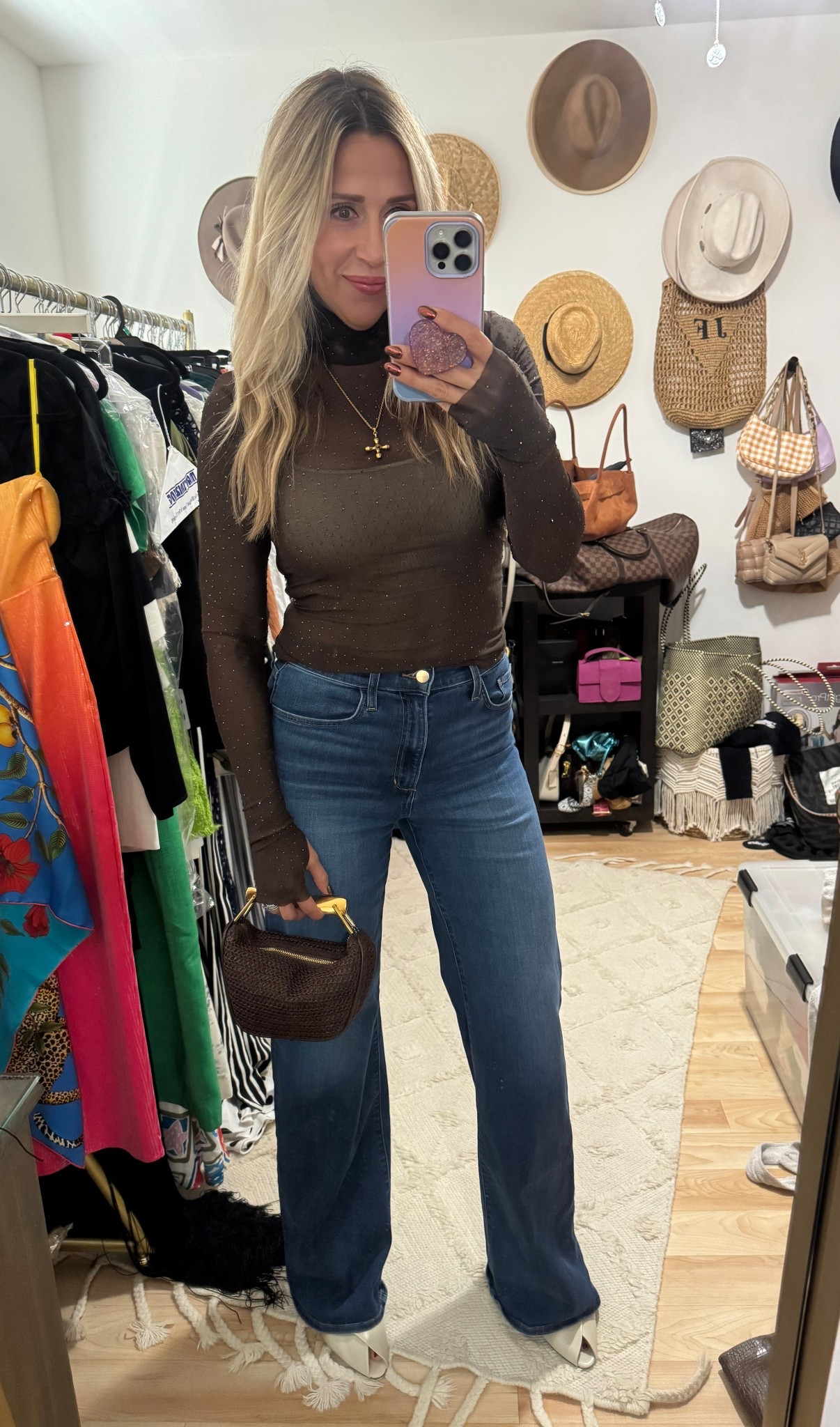  
Such a fun top. Wearing a bralette underneath as it is sheer. Paired with one of my favorite pairs of denim and a fun purse ! 

#LTKItBag #LTKSeasonal #LTKOver40