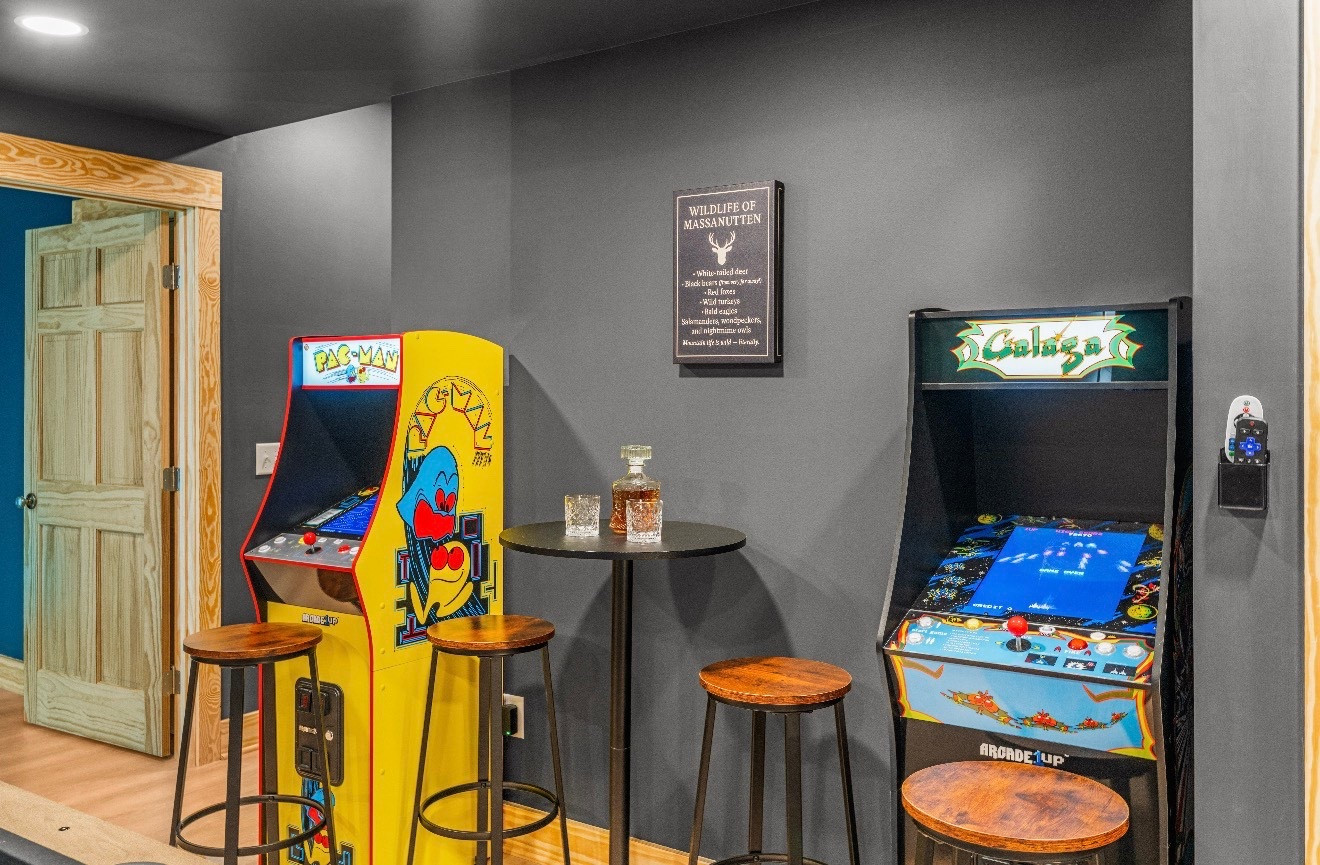 Guests LOVE this little arcade + nightcap nook at Black Diamond Retreat.
It’s one of those spaces adults enjoy just as much as the kids 😆

Linking the bar stools, pub table, decanter set, wall decor + game-room vibes for anyone creating a basement hangout or STR game space.

Because every great vacation house needs a late-night hangout spo

#LTKHome #LTKTravel #LTKKids