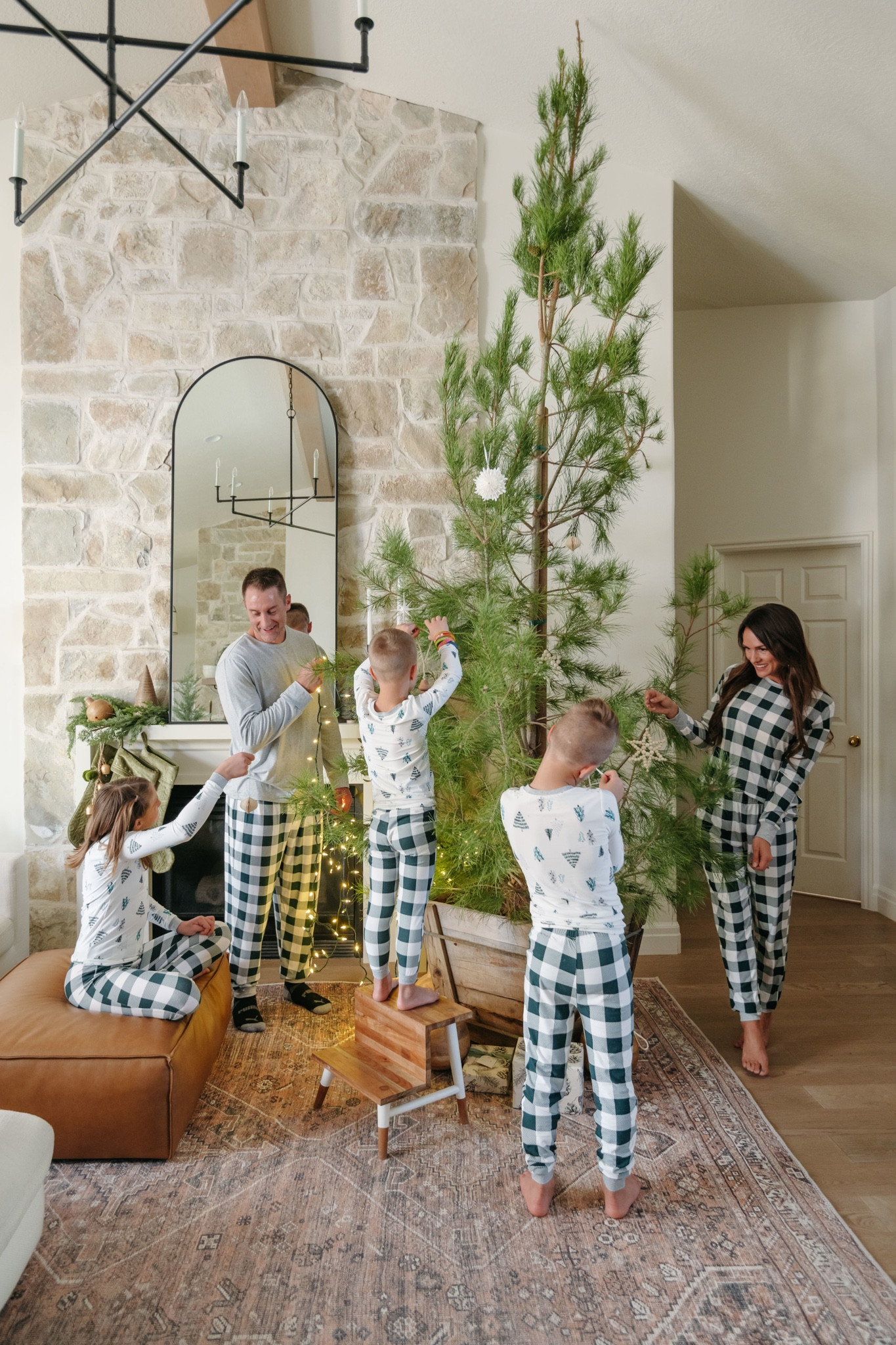 Decking the Halls in matching Christmas pjs! Linking some cozy holiday pajamas for the whole family. Plus they’re a steal! Get them while all the sizes are in stock. 

PS— ordering tip: I found the adult ones ran a tad on the large side. I am wearing a small & Ben has on a large. But the kids ones since they fit more snug I ordered a size up in those! 

#christmas #familyphotos #christmastree 

#LTKsalealert #LTKCyberWeek #LTKHoliday