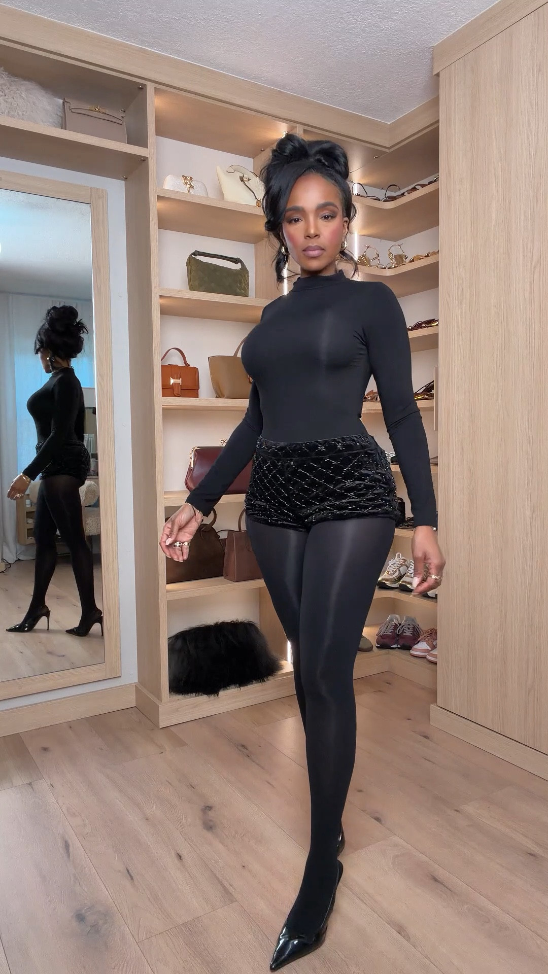 A bold all-black moment that’s sleek, sculpting, and perfect for a night out. The fitted mock-neck top pairs so effortlessly with the velvet quilted shorts and opaque tights — giving that chic, elevated silhouette that still feels edgy. Pointed heels finish the look with polish.

Perfect for holiday parties, date nights, and winter glam moments.

📏 Sizing: Wearing Small | Height 5'4" | 138 lbs | 34D | 27" waist | 40" hips

Tap to get details.

All-black outfit ideas, winter going-out looks, velvet shorts outfit, chic holiday style, elevated all-black fashion.

Follow me on Instagram and YouTube @kirasfashionfinds

#LTKootd #LTKHoliday