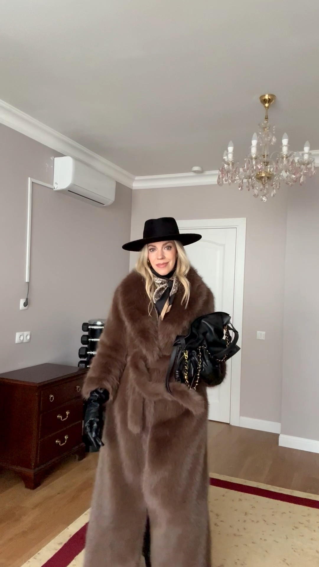 Brown fur coat, chocolate brown, @Janessa Leone black wool fedora hat, Max Mara silk scarf, black leggings outfit, black leather gloves, Loewe Flamenco pouch handbag

#LTKSeasonal #LTKootd #LTKOver40
