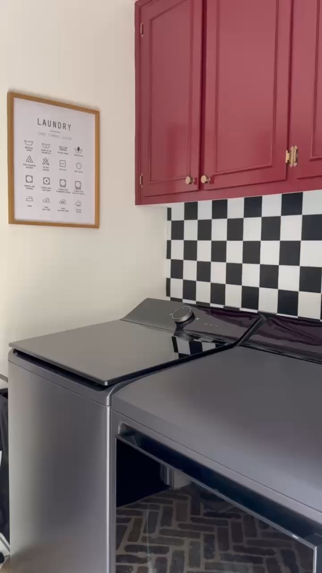 Laundry day just got a whole lot chicer 🧺✨ Loving this modern washer and dryer set paired with bold red cabinetry, a black-and-white checkered tile backsplash, and a laundry care guide wall art that’s as helpful as it is stylish. Even your laundry room deserves good design! 🙌🏽

#eanesinteriors #laundryroomstyle #laundryroomdecor #laundryroomgoals #washeranddryer #checkeredtile #boldcabinets #laundryart #laundryorganization #ltkhome #homeinspo #interiordetails #modernlaundry #utilityroomstyle


#LTKHome #LTKOver40 #LTKStyleTip