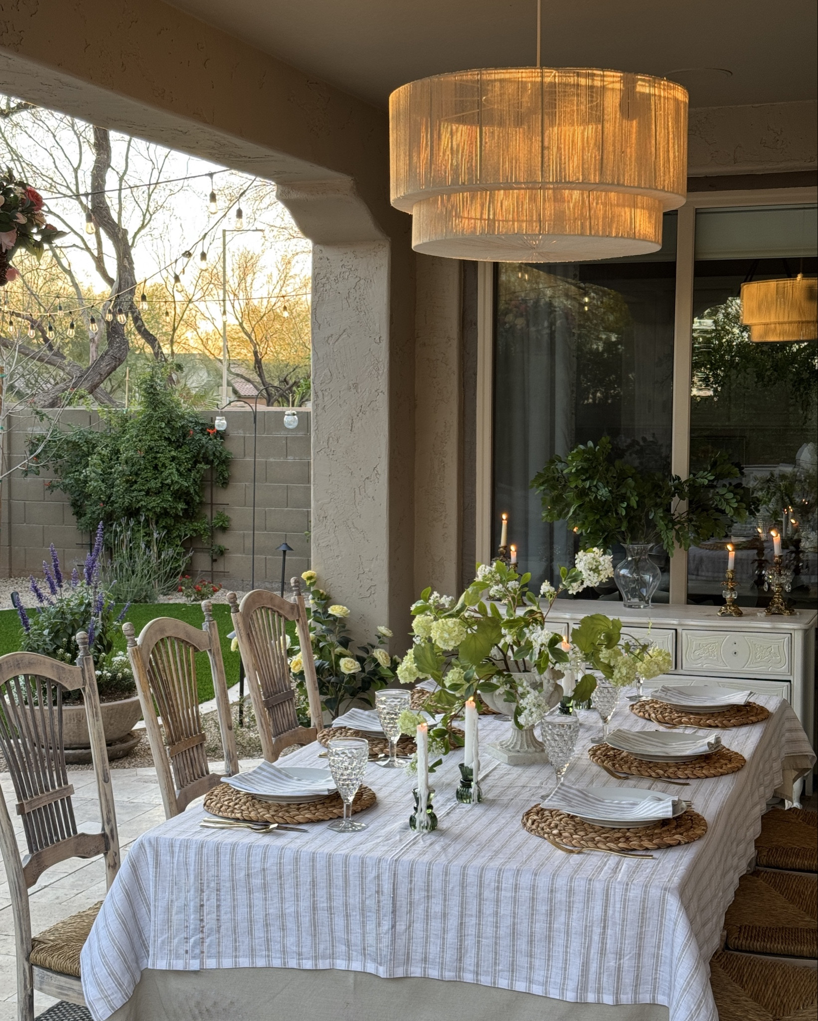 This Elaine rattan chandelier from Rowabi has definitely elevated our patio space. Love the way the evening sun lights up the natural fibers to create its own soft glow. Enjoy an extra 5% off with code LOVELTK.

outdoor lighting, outdoor chandelier, outdoor pendant 

#LTKHome