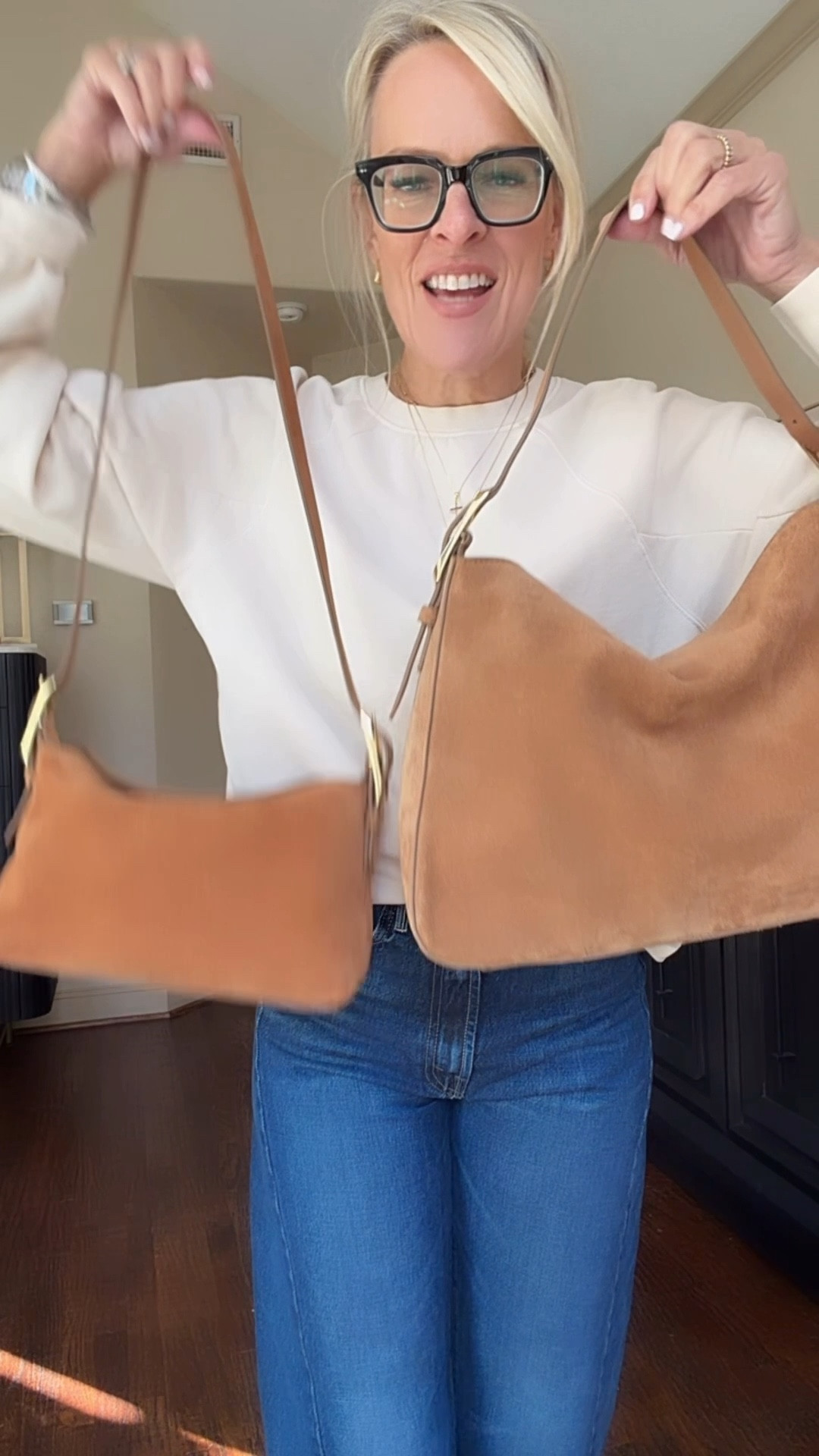 Both of these J.Crew handbags are suede and they are both amazing. I love them equally. I had a request to compare the sizes of the two.
Love that the new mini bag comes with a Crossbody shoulder strap.

Jcrew 

#LTKOver40 #LTKootd #LTKTravel