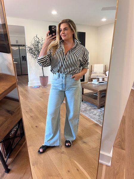 Baggy light jeans with a striped shirt 
.
.
.
Express, frame denim, button down, casual style, comfy style, travel outfit, vacation 

#LTKFind #LTKtravel #LTKcurves