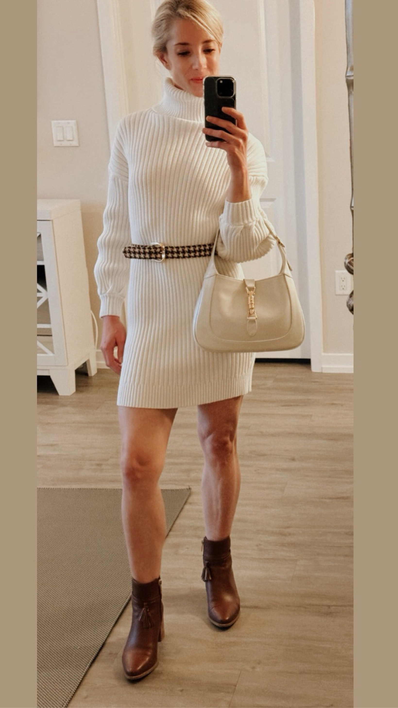 Chic sweater, dress with a loose fit cinch at the waist with a lovely belt. I love this winter classic look! Shop sweater dresses and short brown boots for your 2024 winter wardrobe!

#LTKstyletip #LTKSeasonal #LTKshoecrush