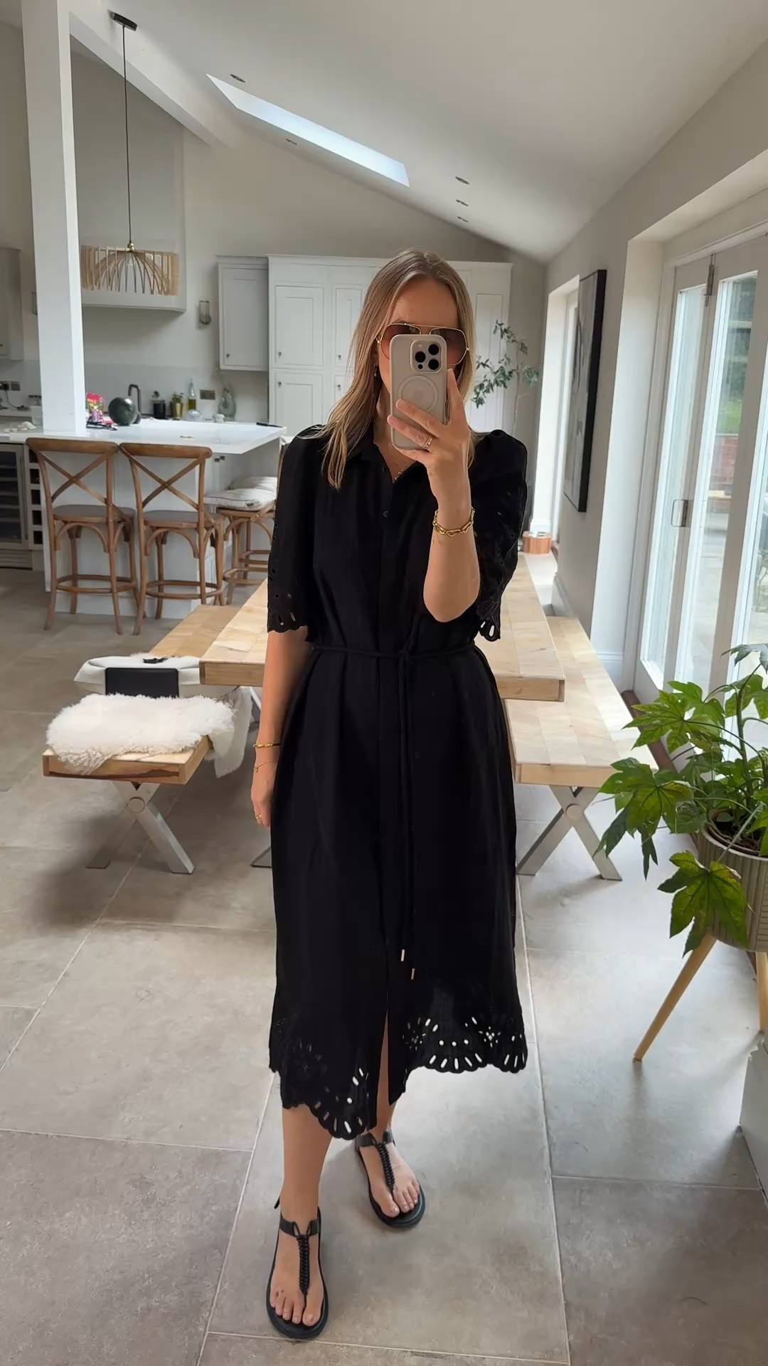 Great shirt dress for the office or a smart casual event … 
Structured shoulder thanks to some pin tucks , beautiful embroidered detailing at the hem and fluted sleeve . Tie belt with metal ends and a great length . I’m wearing the medium and I’m a U.K. 14 . 
Comes in 3 shades. 

Workwear 
Office dress
Black dress
Shirt dress 
What to wear in the heat 

#LTKtravel #LTKsummer #LTKworkwear