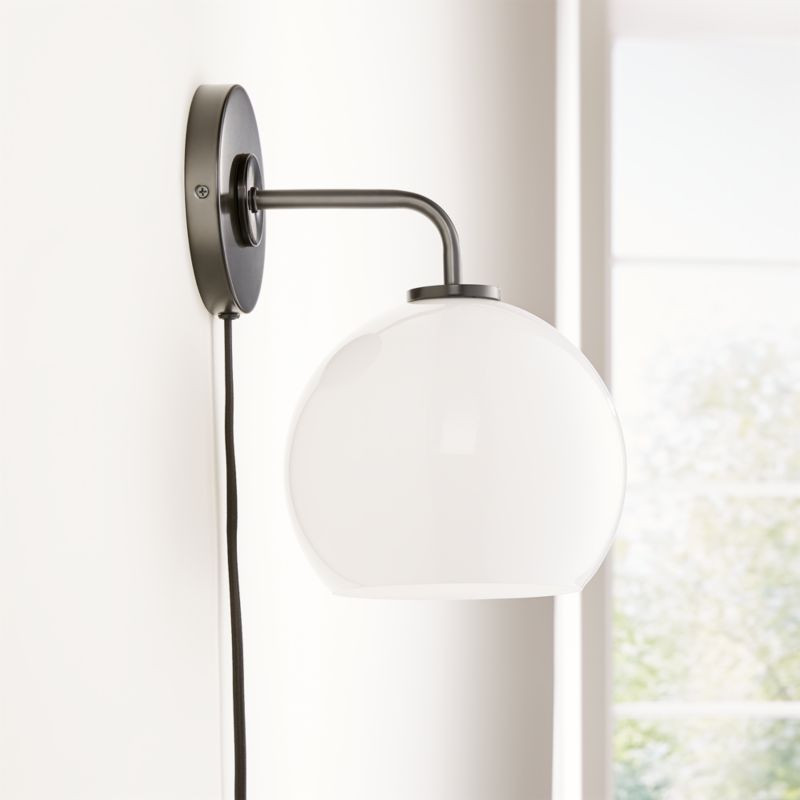 Arren Black Plug In Wall Sconce Bathroom Vanity Light with Milk Round Shade + Reviews | Crate & B... | Crate & Barrel