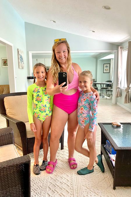 I feel super secure in this bathing suit. The halter top criss crosses and there is a tie in the back! Water park, waves, jump up and down. The ladies are locked in 🤣 the long sleeves are great for the kiddos, limits the amount of time we spend applying sunscreen 

#LTKfamily #LTKswim #LTKkids