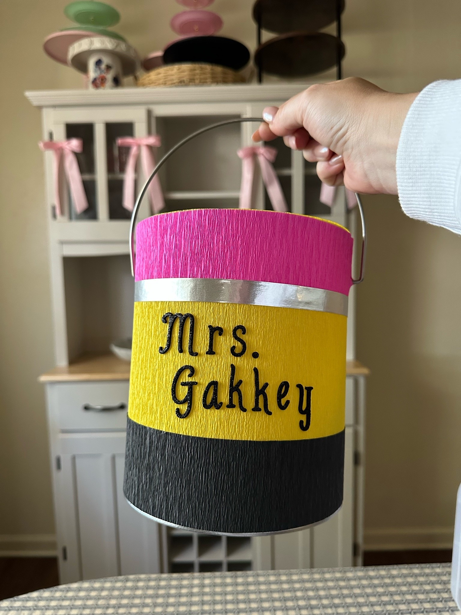 Loving this super cute and easy pencil container. Using crepe paper to cover it to create the pencil and filled with items to create the yearly photo magnets.

#LTKmomlife #LTKSeasonal #LTKHome