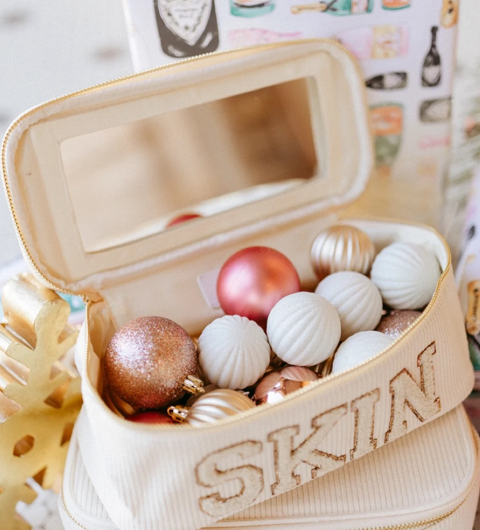 Corduroy cosmetic bag with trendy SKIN letter patches. 4.75″X 10″X 4.25″ lined for an easy wipe clean and mirror 

#LTKtravel #LTKHoliday #LTKbeauty