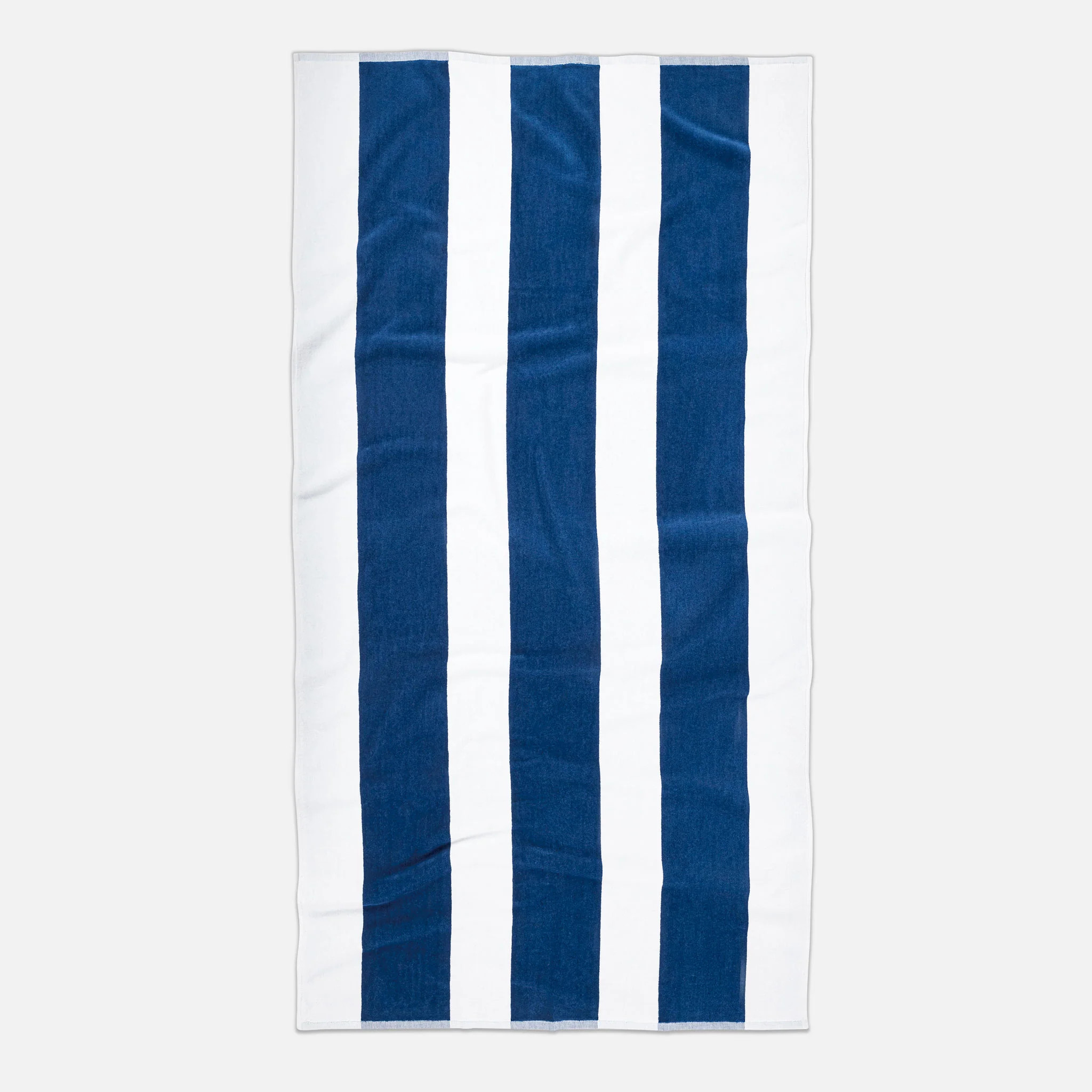 Brooklinen Cabana Stripe Beach Towel in Riviera Blue | Brooklinen