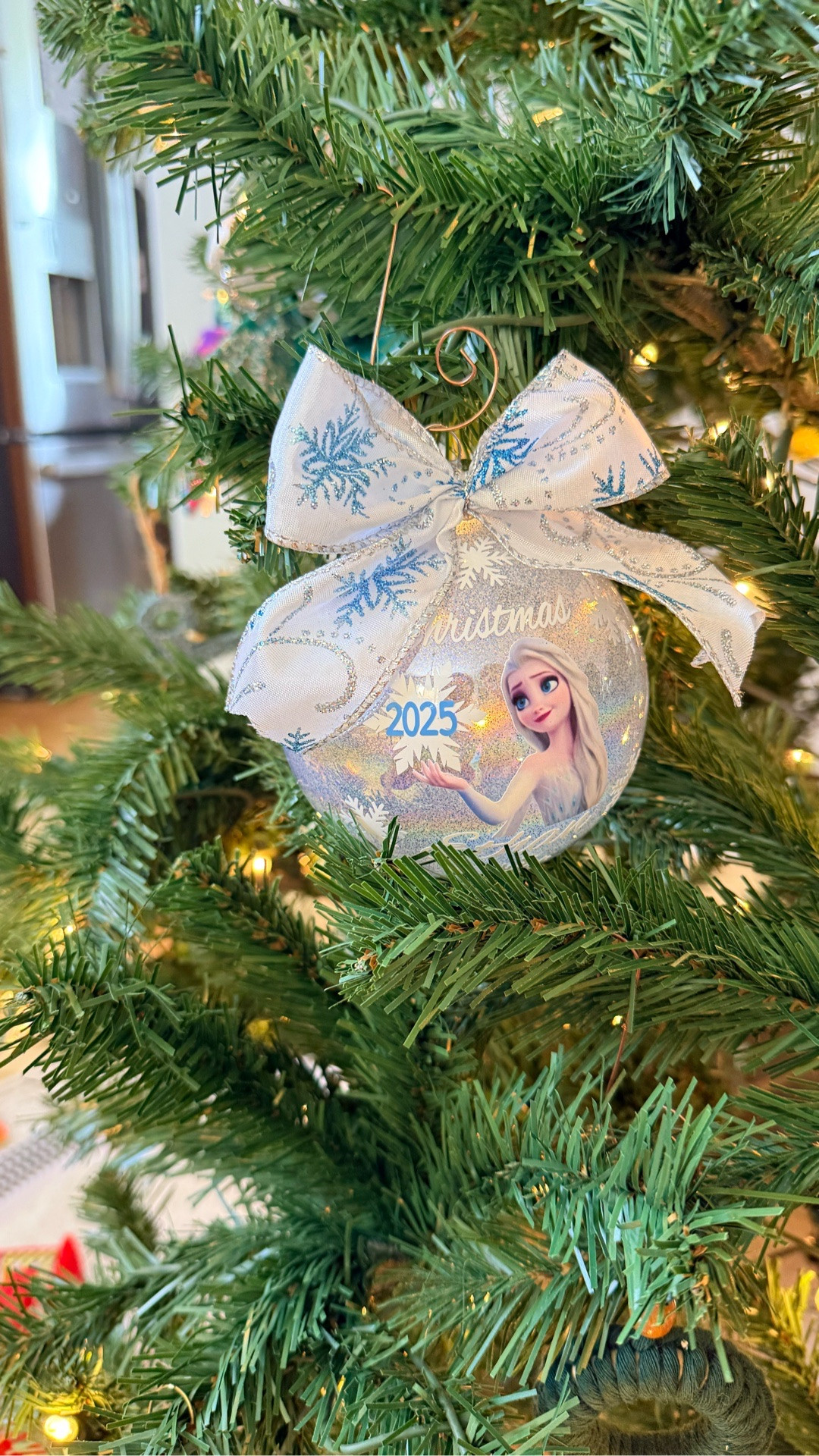 My son showing off the Elsa ornament I got for him this year!

#LTKHoliday