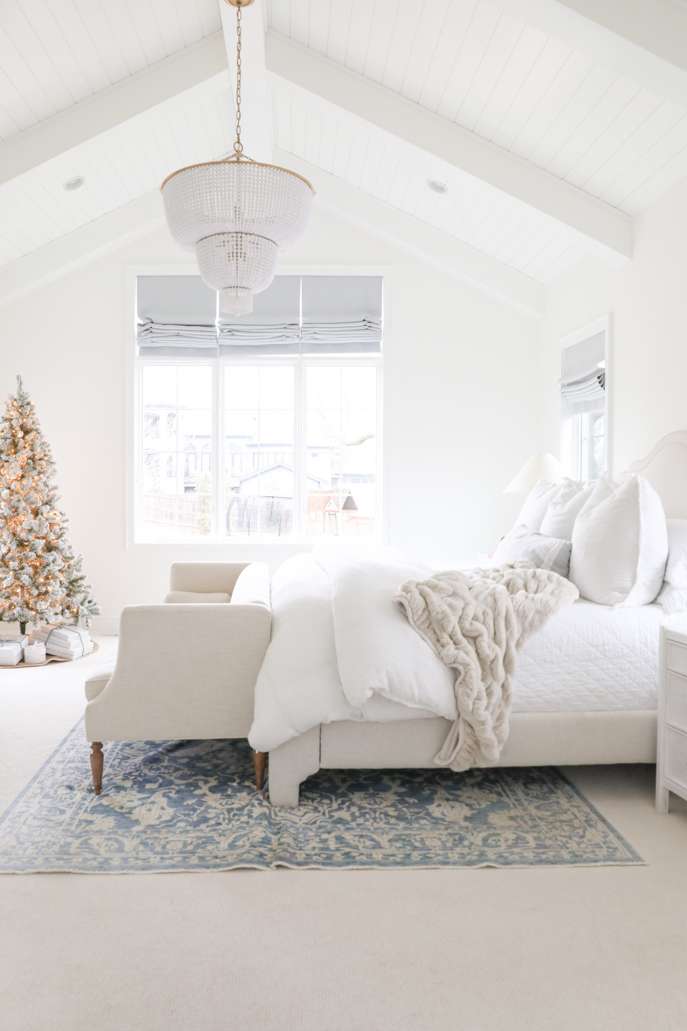 Bedroom, Christmas tree, blue bedroom, primary bedroom, upholstered bed, Jacqueline chandelier, faux fur throw, blue rug, 

#LTKhome #LTKSeasonal #LTKHoliday