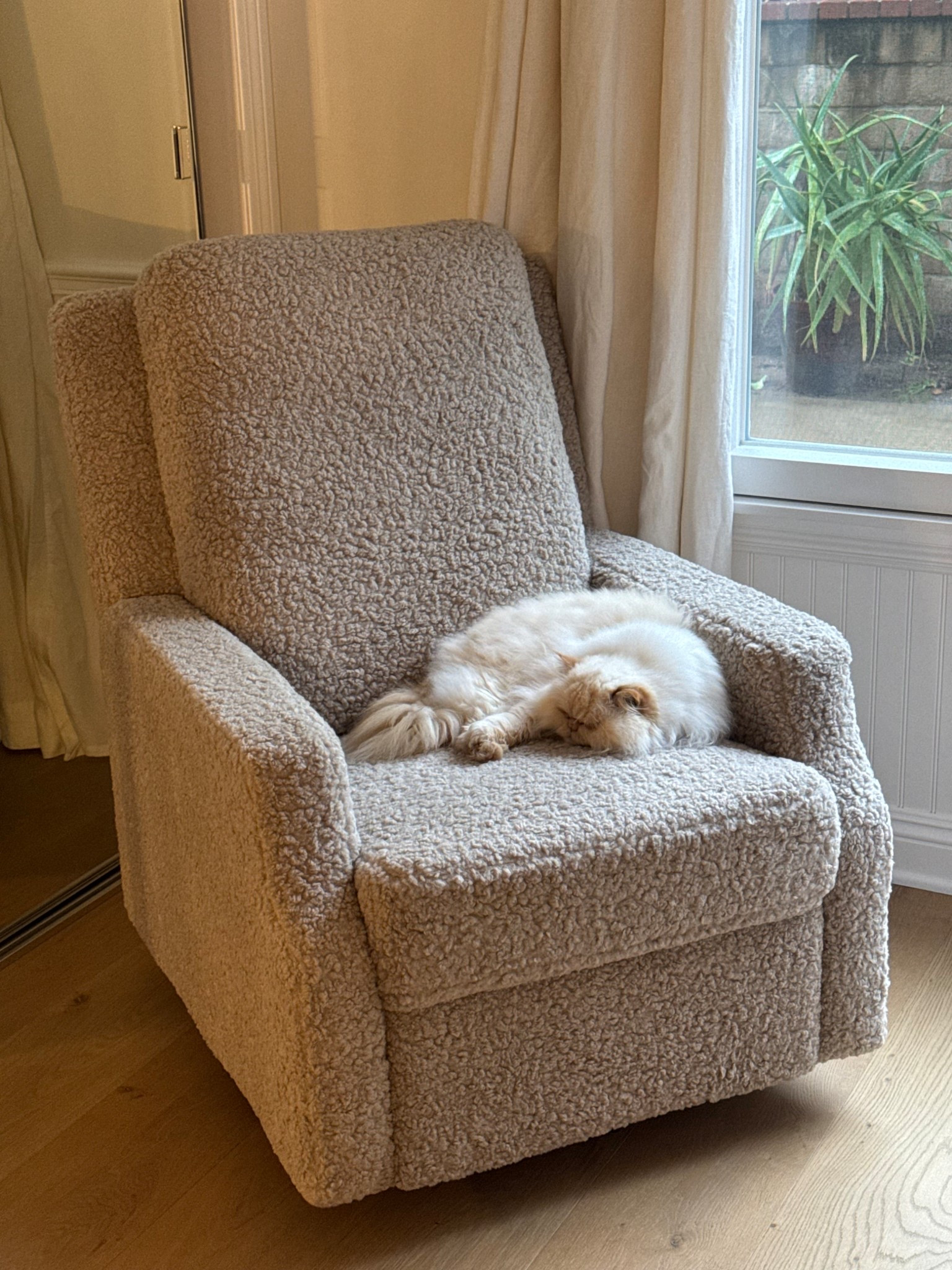 NURSERY CHAIR:
NAMESAKE CREWE RECLINER AND SWIVEL GLIDER. - chai sherling