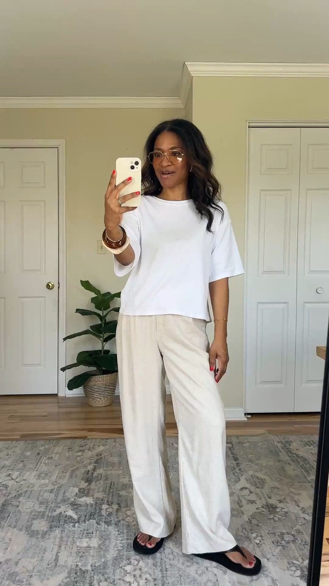 Wearing a medium in the T-shirt. I don’t find it see-through but I do wear a nude colored bra. I’m wearing a size 27 regular in the linen pants from Abercrombie. My shoes are true to size linking similar pairs as well. ￼

#ltkgrwm #ltkootd #ltkover40

