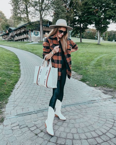 This buffalo check shacket is perfect for fall 2022 and is on major sale! It is shacket season, my friends 🙂 Sometimes I think I have all the shackets I need in my life, and then I come across a super cute one like this RDI buffalo check shacket that is 70% off and I realize I do not! I love the neutral fall colors of this shacket, and it was so much fun pairing it with some faux leather leggings and my favorite new cowboy boots for a Skitoberfest look!

#LTKunder50 #LTKstyletip #LTKSeasonal