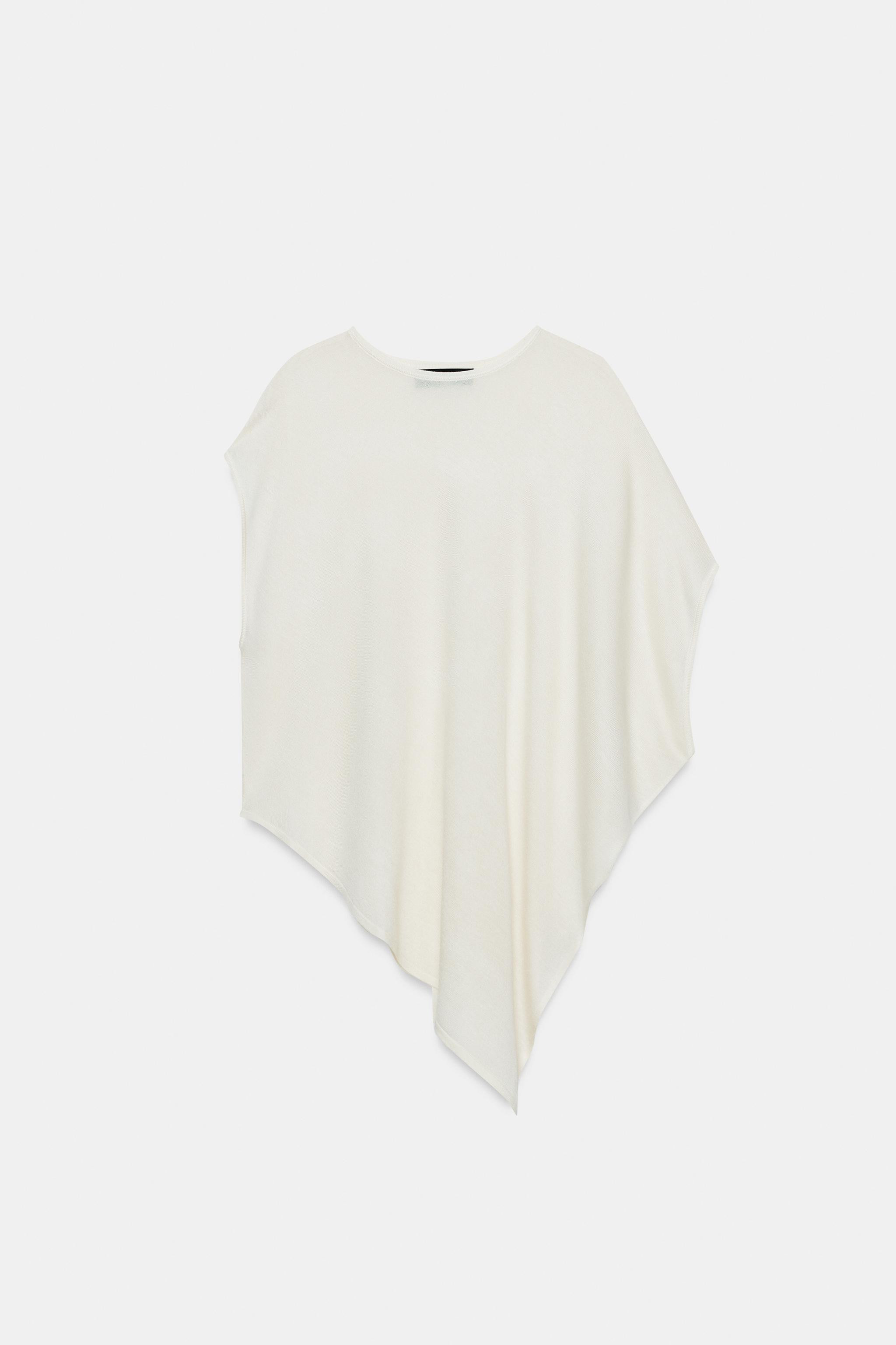 DescriptionColorContentsMeasurementsFlowy round neck top. Asymmetric sleeves and hem.ecru-white95... | Zara US