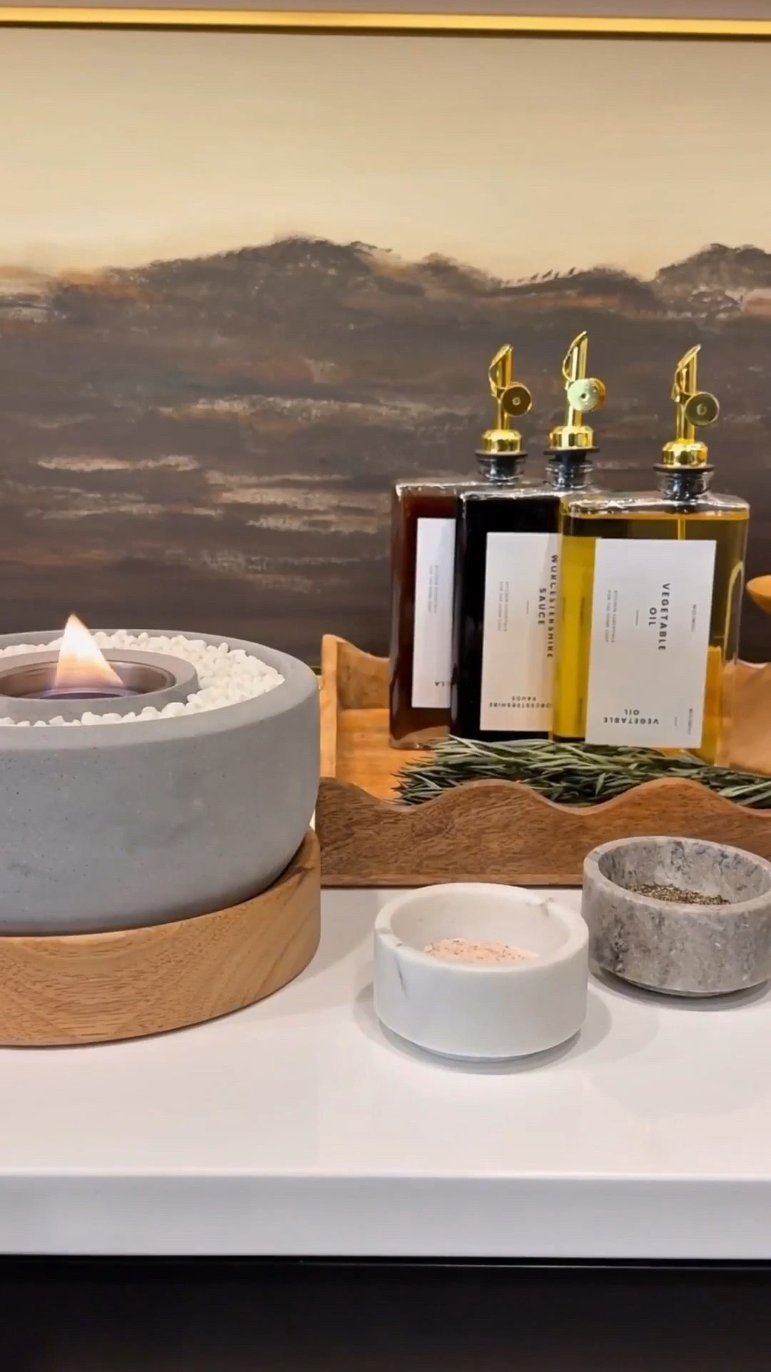 Here are a few simple ways I made my kitchen look more expensive, elevated, and cozy. These affordable kitchen upgrades and decor pieces add warmth, texture, and a high‑end feel without a full renovation:
• under‑cabinet lighting
• real or realistic faux florals
• small accent lamp
• minimal decorative jars
• oversized pendant lighting
• upholstered counter stools
• tabletop fire‑pit
• oversized salt & pepper mill
• unique, large cutting boards
• book holder
• decorative oil bottles
• candles
• simple linen towels
• plush kitchen runner
• wooden fruit bowl
• updated cabinet hardware
• dimmable lighting (in every room, truly a game changer)
• large ceramic bowl



#kitchendecor #luxurykitchenideas #amazonhome #kitcheninspo #warmkitchen #cozykitchen #blackcabinetsinkitchen #summerthompsonstyles


#LTKvlog #LTKHome #LTKdayinmylife