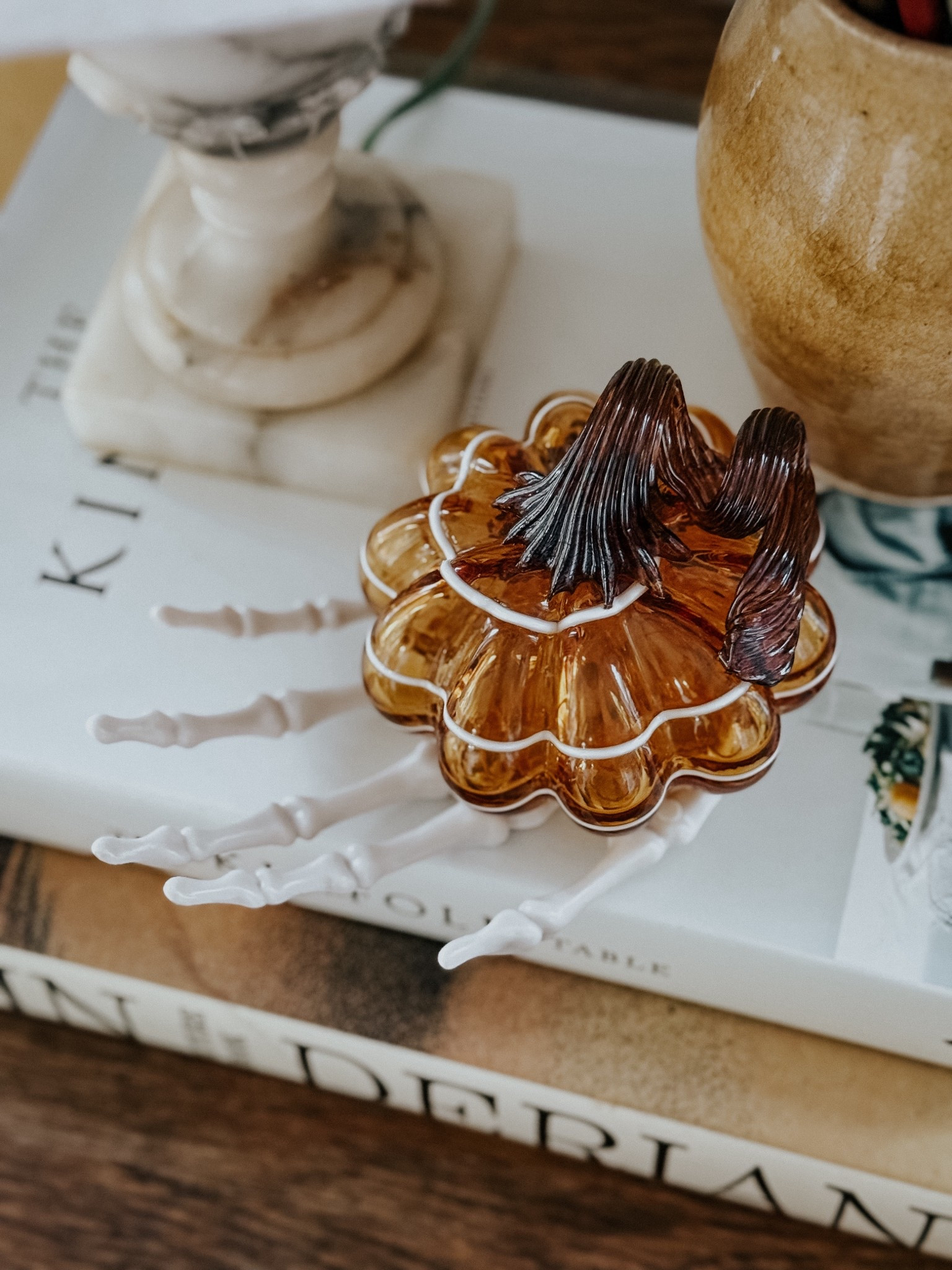 Hand blown glass pumpkin & a skeleton hand

#LTKHome #LTKHalloween #LTKSeasonal