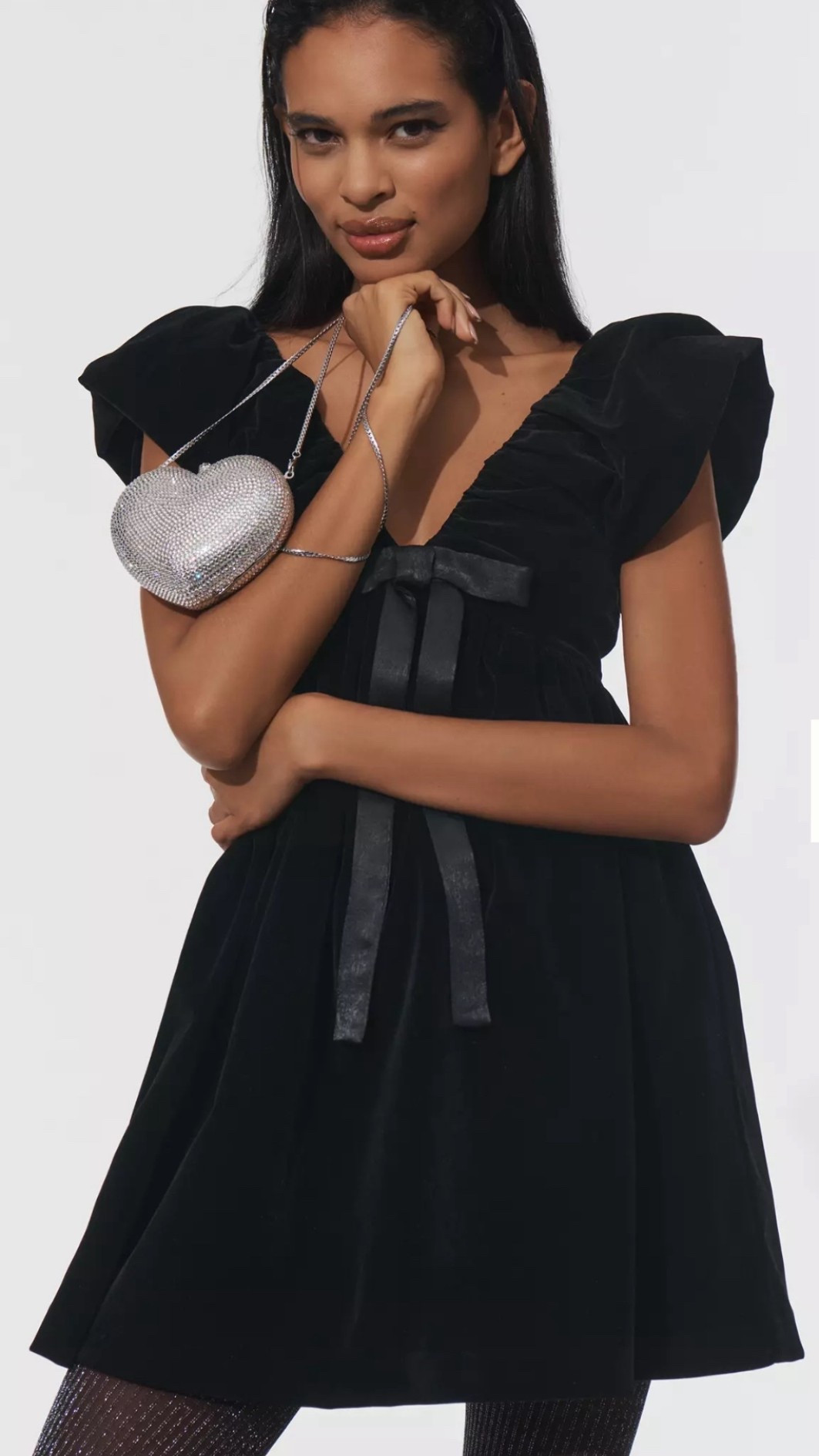 Anthropology holiday dress 
Work party 
Velvet dress 
Bows 

#LTKSeasonal #LTKWedding #LTKHoliday