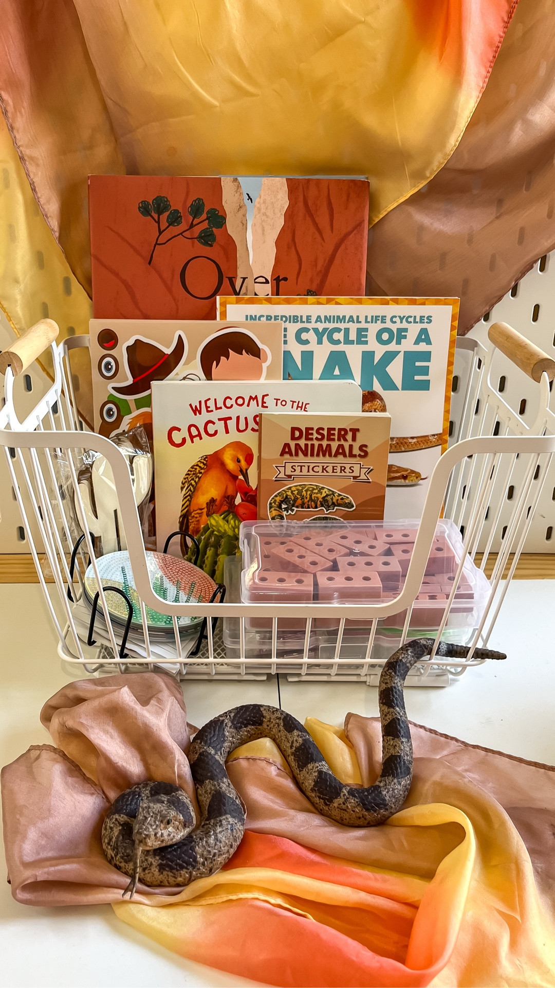 When it’s as hot as the desert so you want to stay indoors. Put together a little activity basket so the kids don’t go stir crazy during this heat wave.
🏜️ 
I always have some version of these activities on hand but I try to change it up to match the theme. Stickers and painting are a must. The kids are currently obsessed with diamond art and these cactus coasters are adorable. I always have whatever books we’re reading for the day and some kind of building materials. 
🌵 
It’s a sanity formula that never fails

#LTKBaby #LTKKids #LTKSeasonal