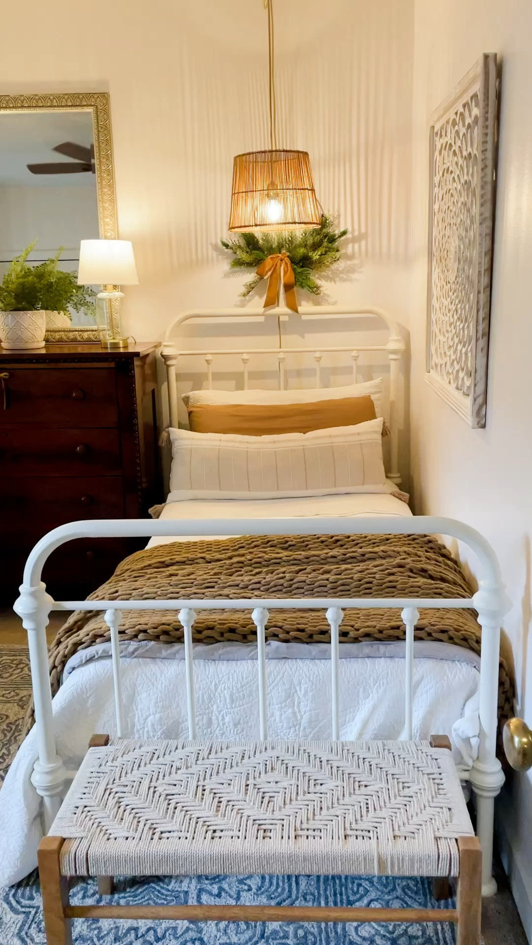This neutral bedroom decor is so calming. I’ve linked similar metal twin beds that come in several finishes as well as bedding, mirror, bench, dresser and rug options.  

#LTKhome