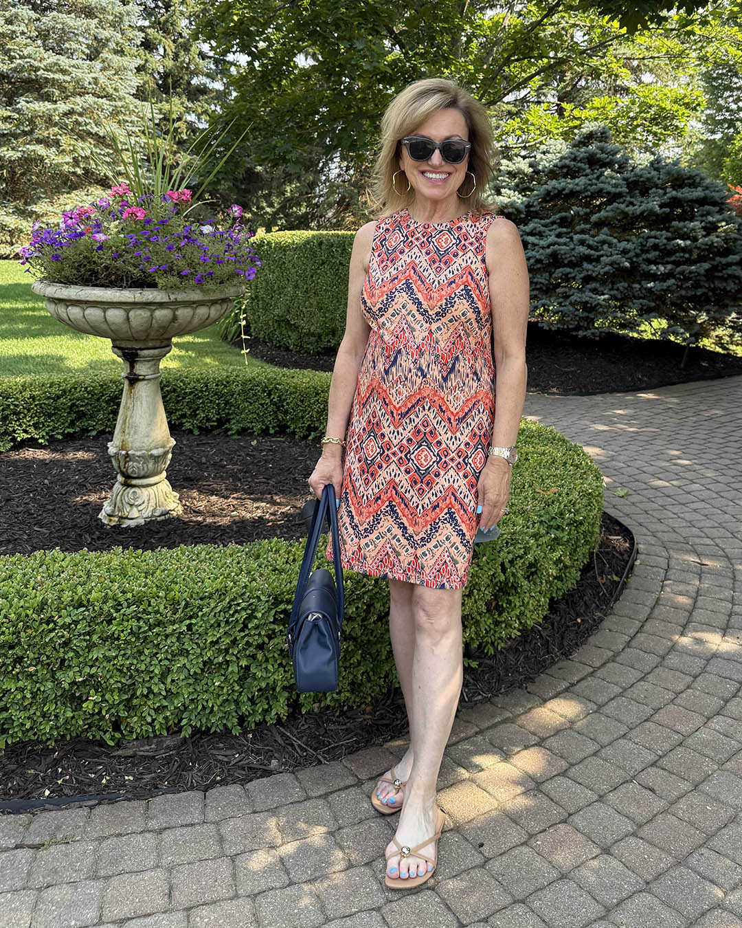 If you're shopping for a dress right now, don't just shop for summer.

I bought this dress specifically with the transition to fall in mind. Because at this point in the season, I want anything new I buy to work now and later.

For me, that means looking at three things: color, fabric and versatility.
The print and lightweight fabric work perfectly for summer with sandals and sunglasses, but the deeper colors can easily move into early fall. Add a denim jacket, sneakers and a richer accessory, and the same dress suddenly feels completely different.

My late-summer shopping test? Can I wear it for the weather I'm dressing for now AND style it for the season that's coming next?

If the answer is yes, that's a dress with considering.

#LTKootd #LTKOver40 #LTKSeasonal