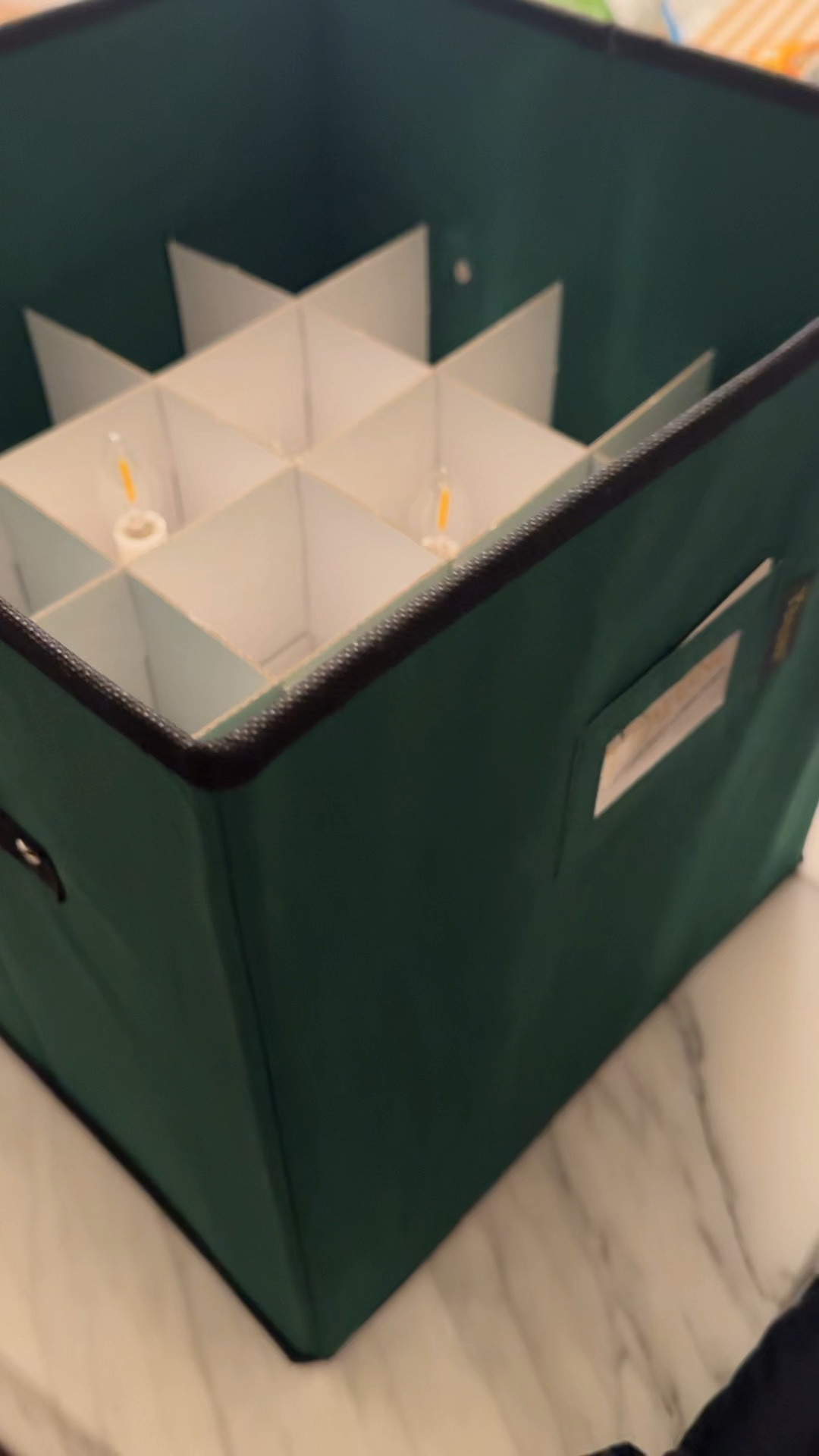 Used this ornament storage box to safely store my window candles #organization #christmasstorage #organize #home 

#LTKHome