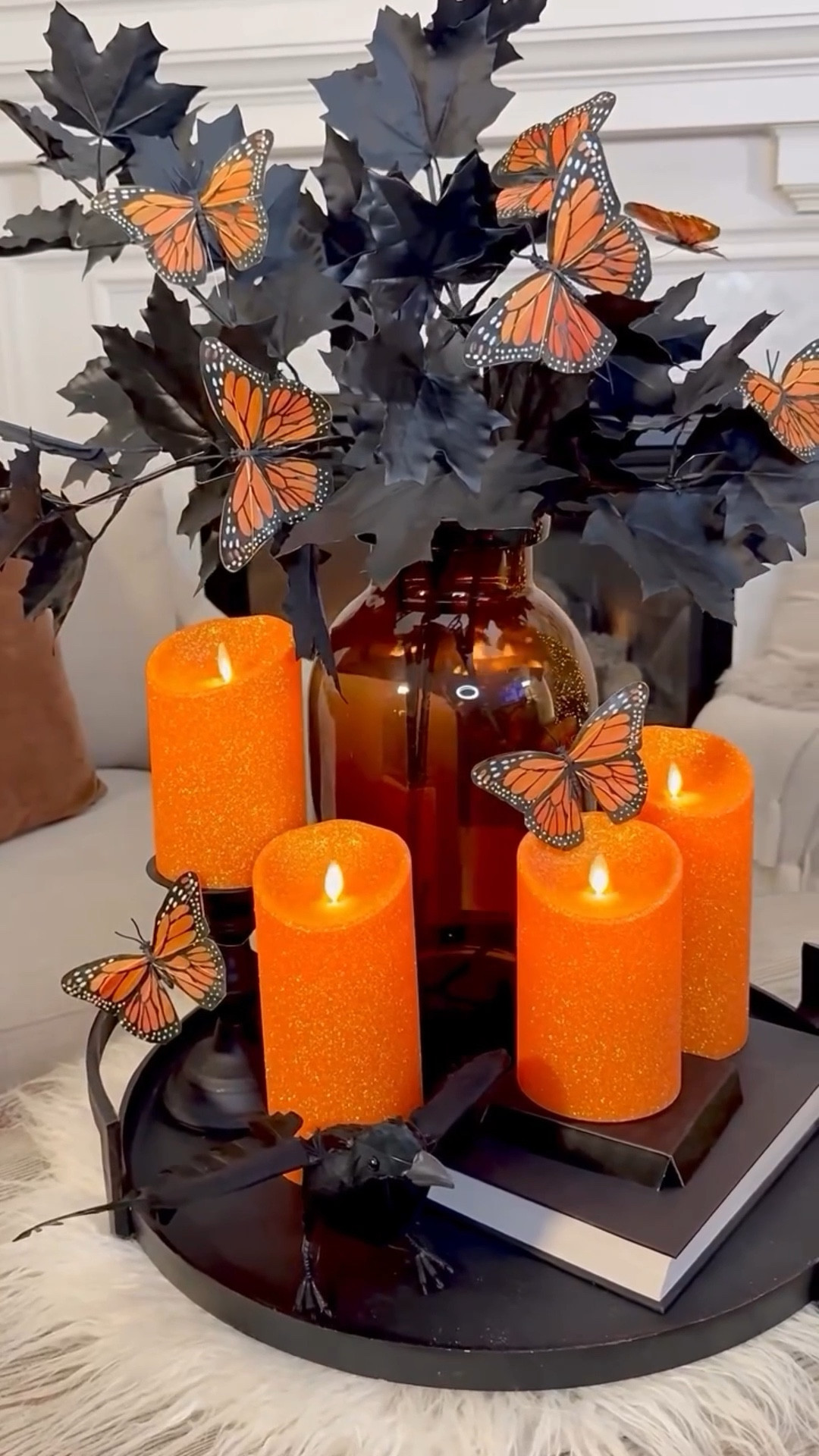 Candlelit Autumn Monarch Tray 🧡
Russet orange and monarch wings are such an unexpected match for Halloween — and I’m obsessed with how they play together. The warm tones feel so autumn, while the black-edged wings add just the right touch of mystery.

Of course, I had to style it with my favorite Luminara candles in a fine glitter finish. I love decorating with them! Their patented flame-effect technology gives you all the beauty of a real candle, without any of the worry, so I can layer in that cozy glow and a little sparkle anywhere I want fall warmth with Halloween drama.

#FalloweenVibes #HalloweenAesthetic #MoodyFallDecor #LuminaraCandles #FallStyling

#LTKSeasonal #LTKStyleTip #LTKHome