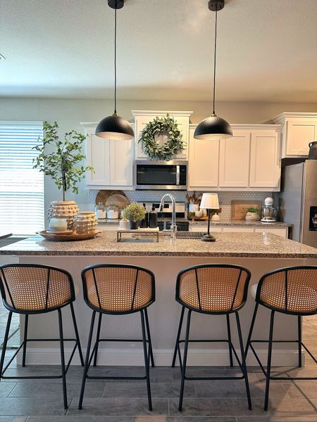 Kitchen inspiration with beautiful Monday lighting, counter height barstools, greenery, vases and warm woods 

#LTKstyletip #LTKxTarget #LTKhome