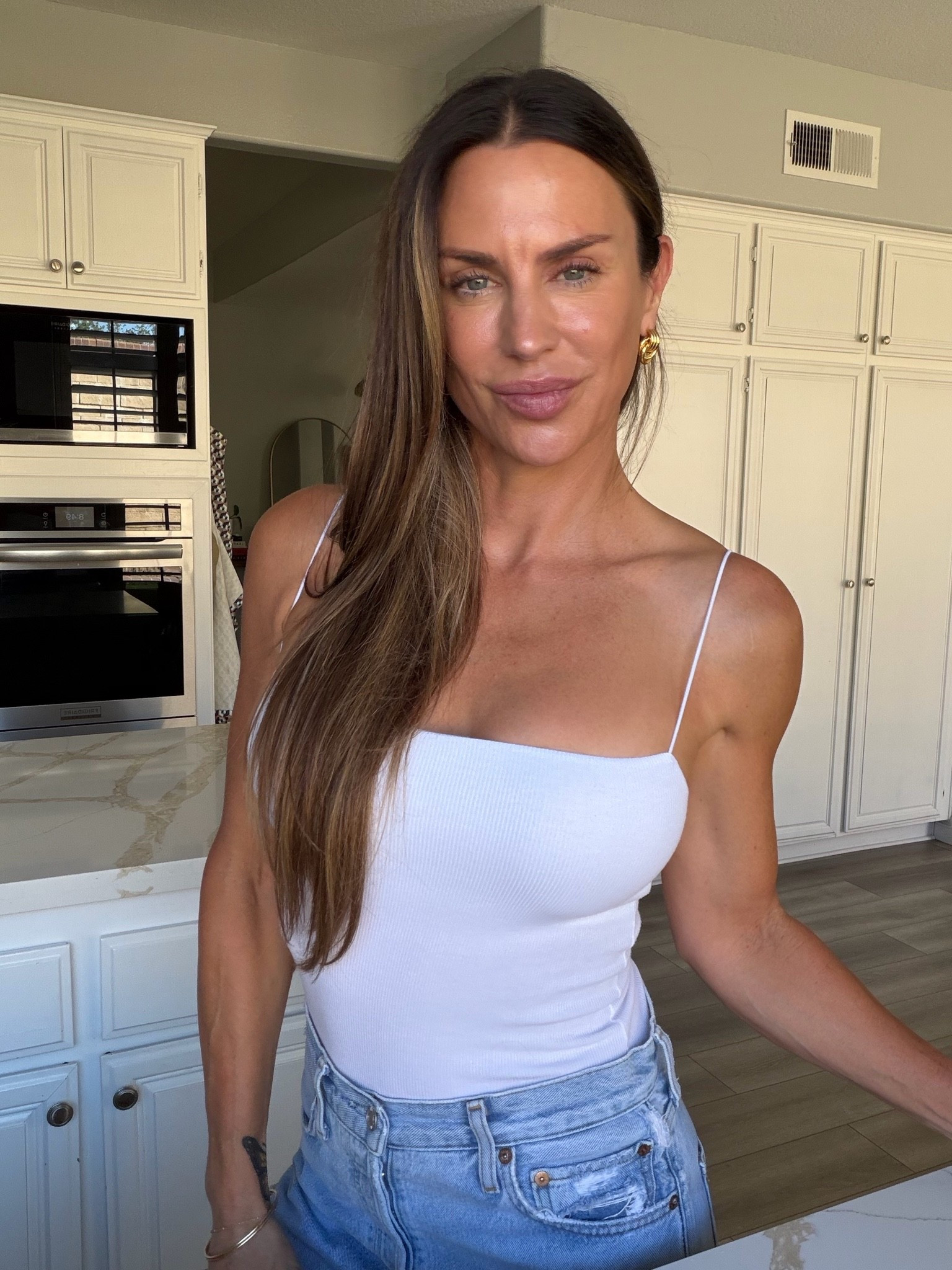The BEST tank. So flattering and gorgeous for summer 🤍

#LTKootd #LTKOver40