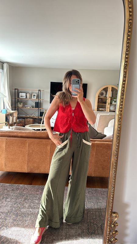 My new favorite Free People outfit. The pants are a size small they do run along but I love them so much and the stripes on the back. This color goes so well with a red top and this vest is adorable. I got a size small. I would also wear these espadrille in red or go with the black-and-white checkered vans.

Spring outfit, red vest, green pants, Mom outfit

#LTKSeasonal