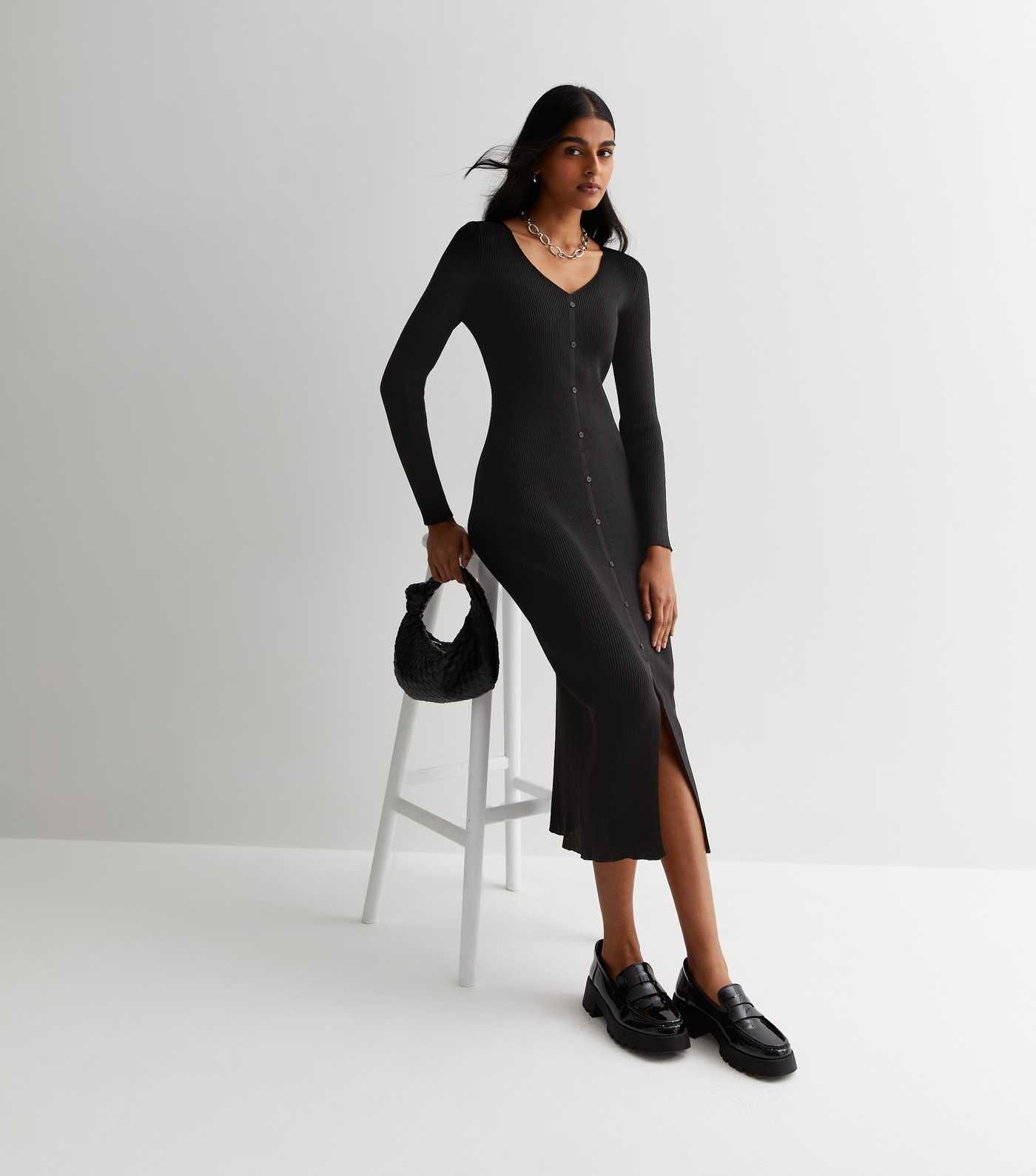 Black Ribbed Knit Bodycon Midi Dress
						
						Add to Saved Items
						Remove from Saved Item... | New Look (UK)