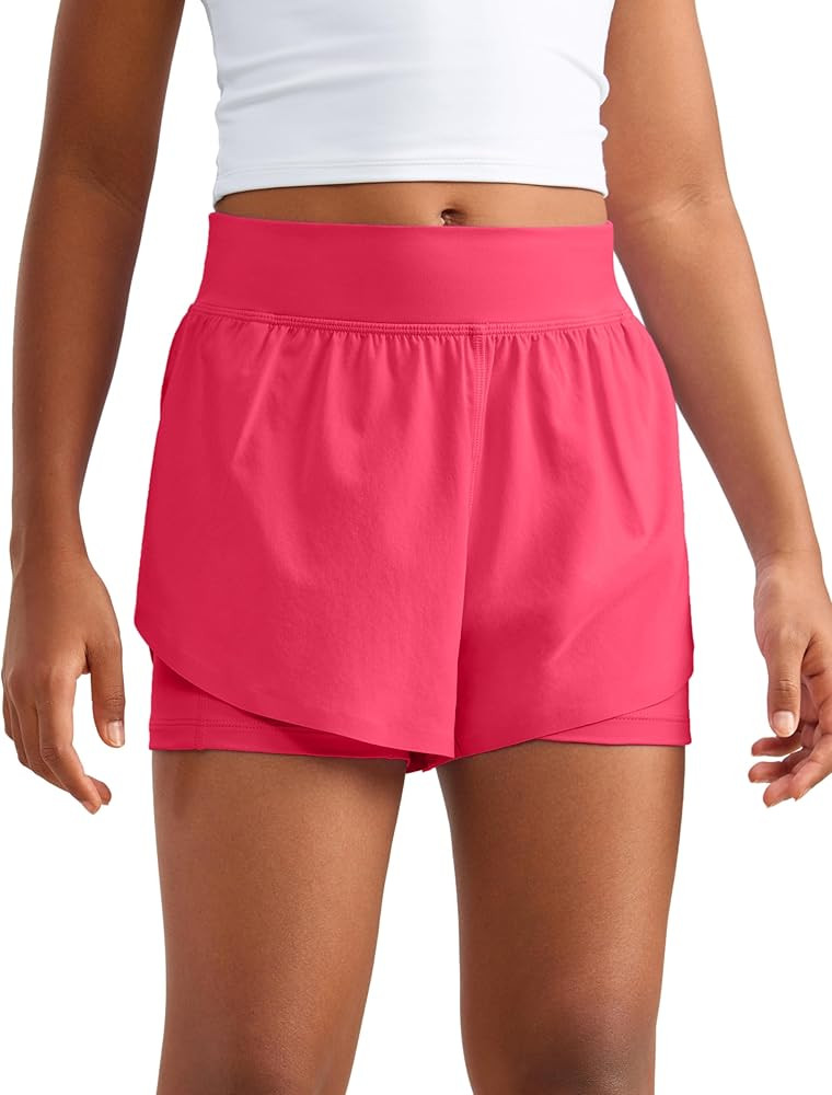 CRZ YOGA Girls 2 in 1 Dolphin Athletic Running Shorts with Pockets High Waist Teen Kid Workout Ca... | Amazon (US)