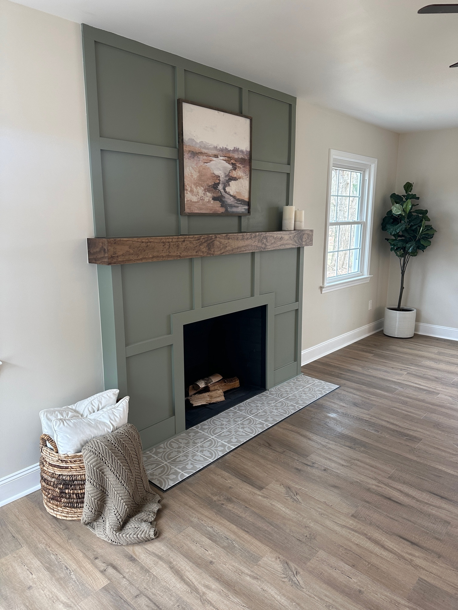 Fireplace remodel // board and batten // grid fireplace // fireplace hearth // wood mantle // living room // home remodeling 

#LTKfindsunder100